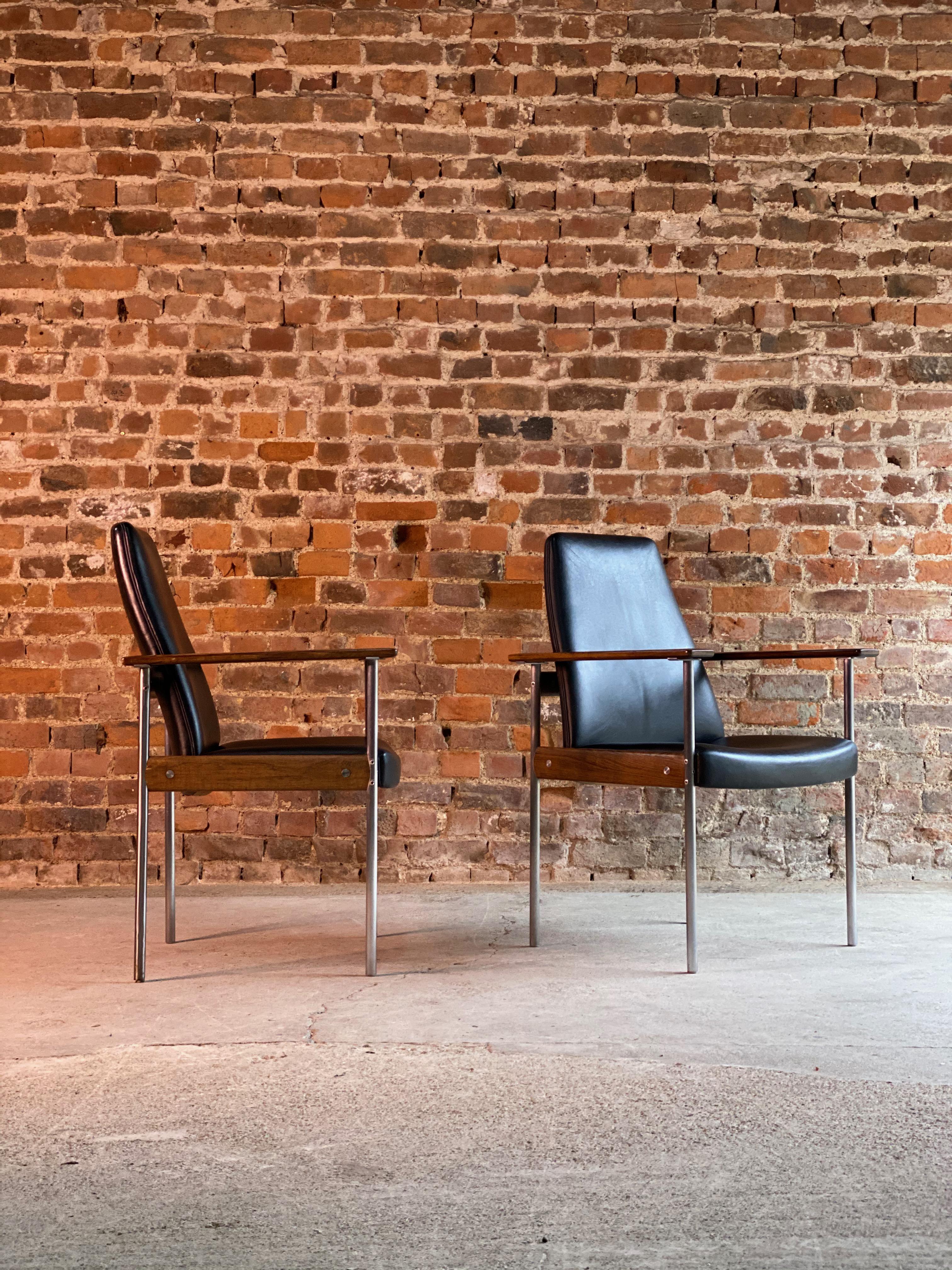 Sven Ivar Dysthe (Norwegian, b.1931) for Dokka Møbler: A pair of 1960s rosewood, black upholstered and brushed steel armchairs, each with applied labels Dokka Møbler made in Norway, 65 cm wide, 54 cm deep, 94 cm high with CITES A10