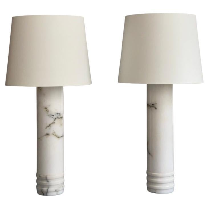 Pair of 1960s Scandinavian table lamps in white marble and new linen shades.