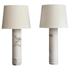 Pair of 1960s Scandinavian table lamps in white marble and new linen shades.