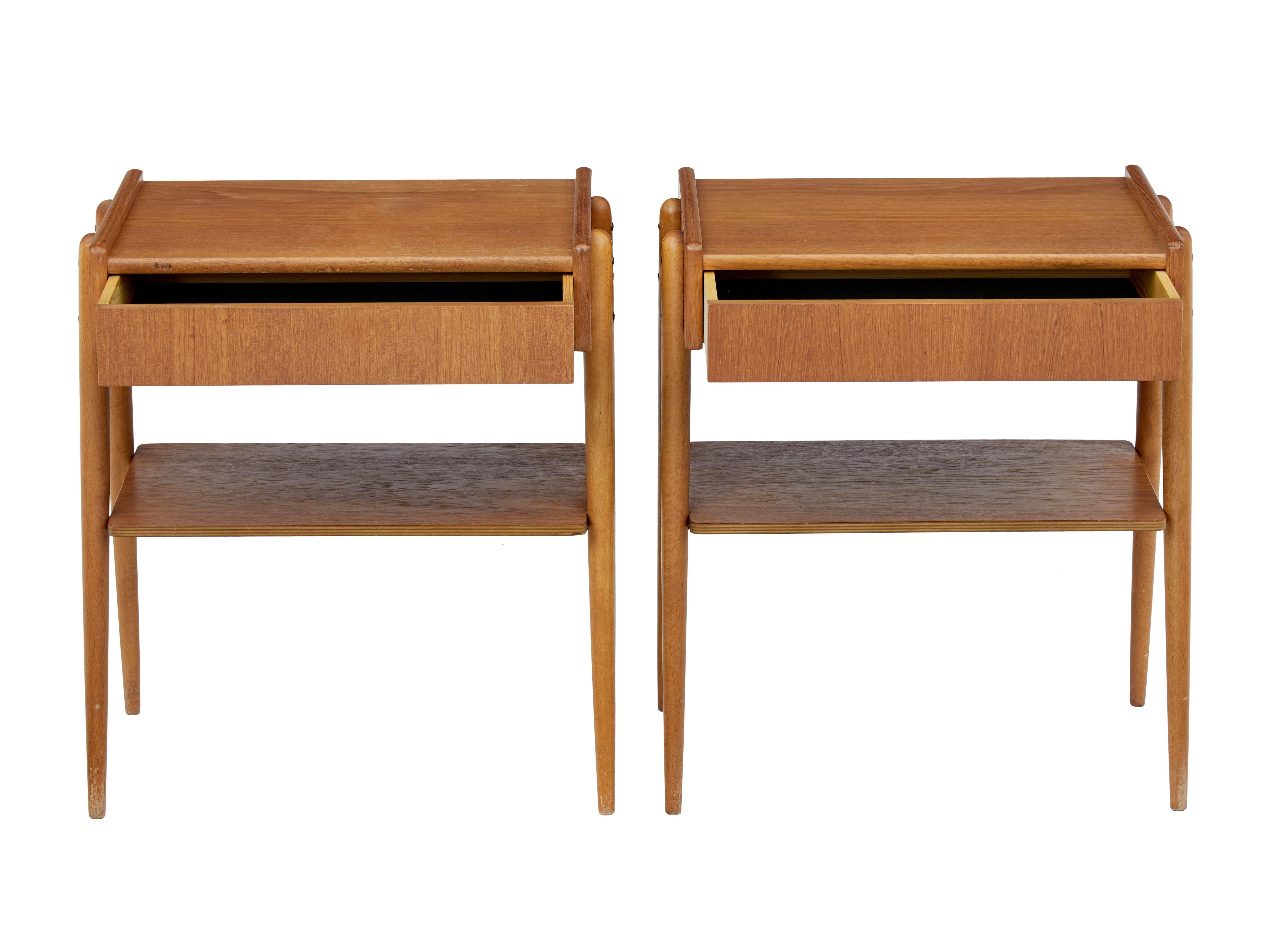 Fine pair of Scandinavian teak bedside tables, circa 1960.

Teak top surface with single drawer below. Design allows the leg structure on the outside which supports the shelf.

Minor surface marks.