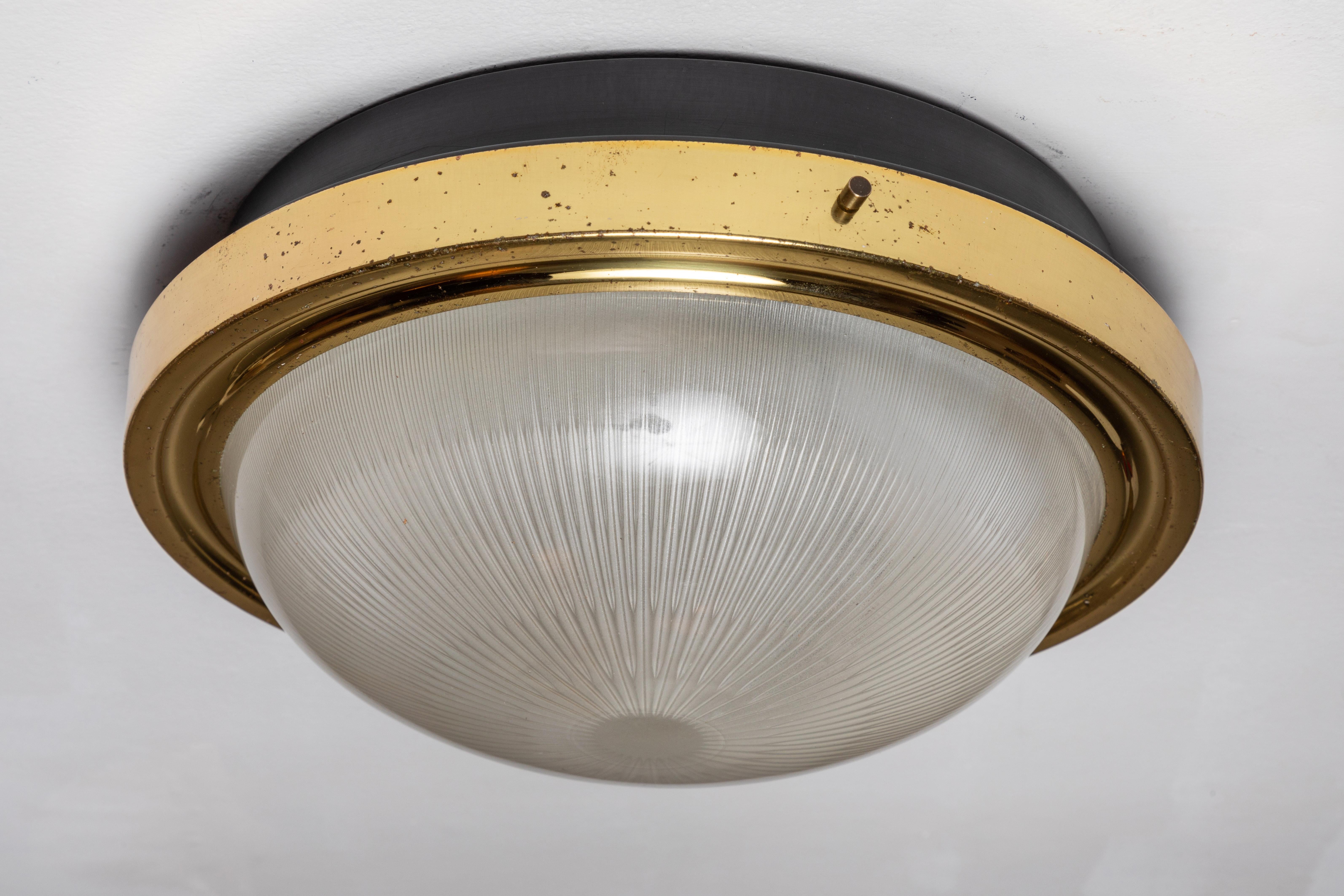Pressed Pair of 1960s Sergio Mazza Brass and Glass Wall or Ceiling Lights for Artemide For Sale