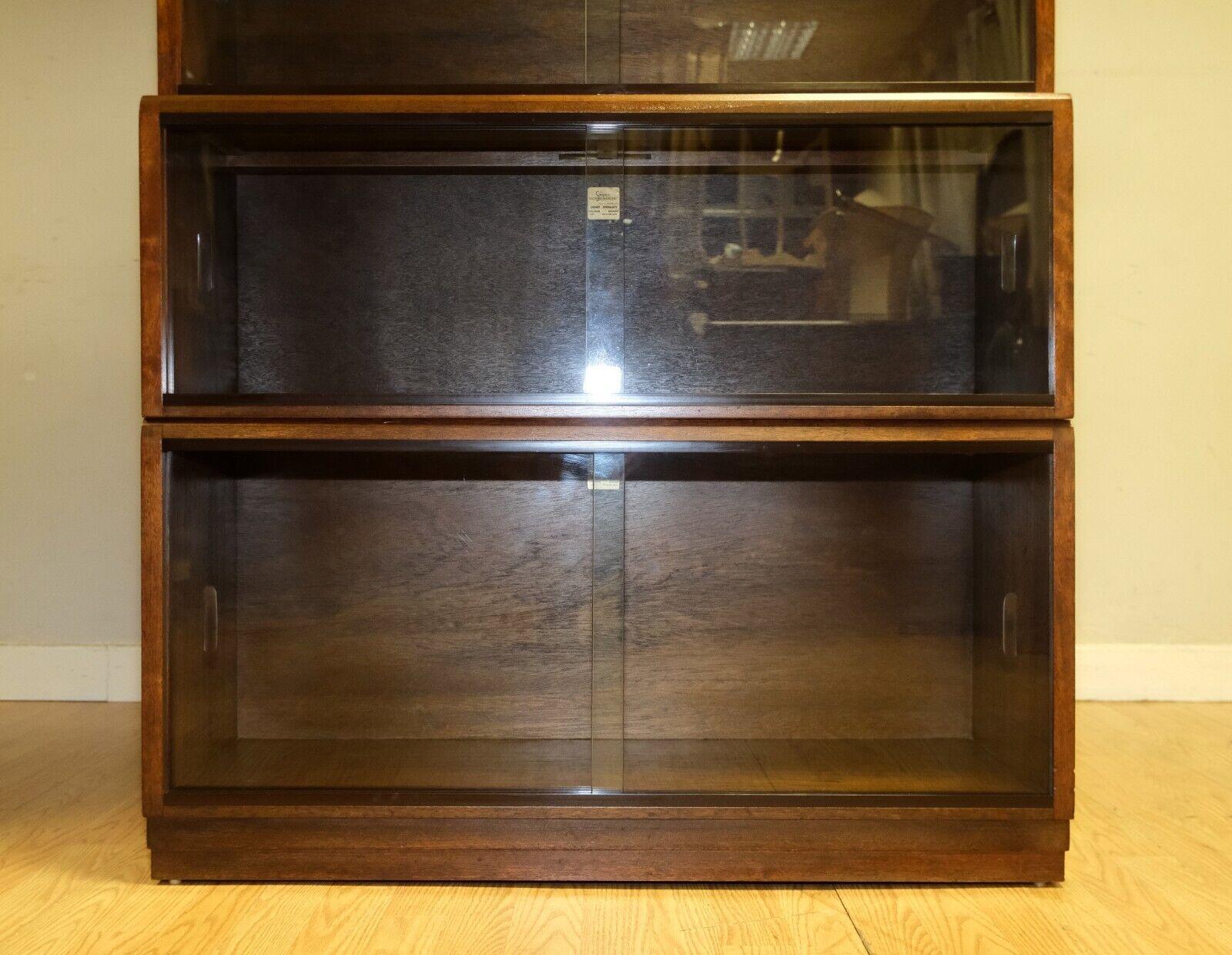 Glass PAIR OF 1960'S SIMPLEX HARDWOOD FULL SIZED LIBRARY STACKING BOOKCASES FiVE PIECE For Sale