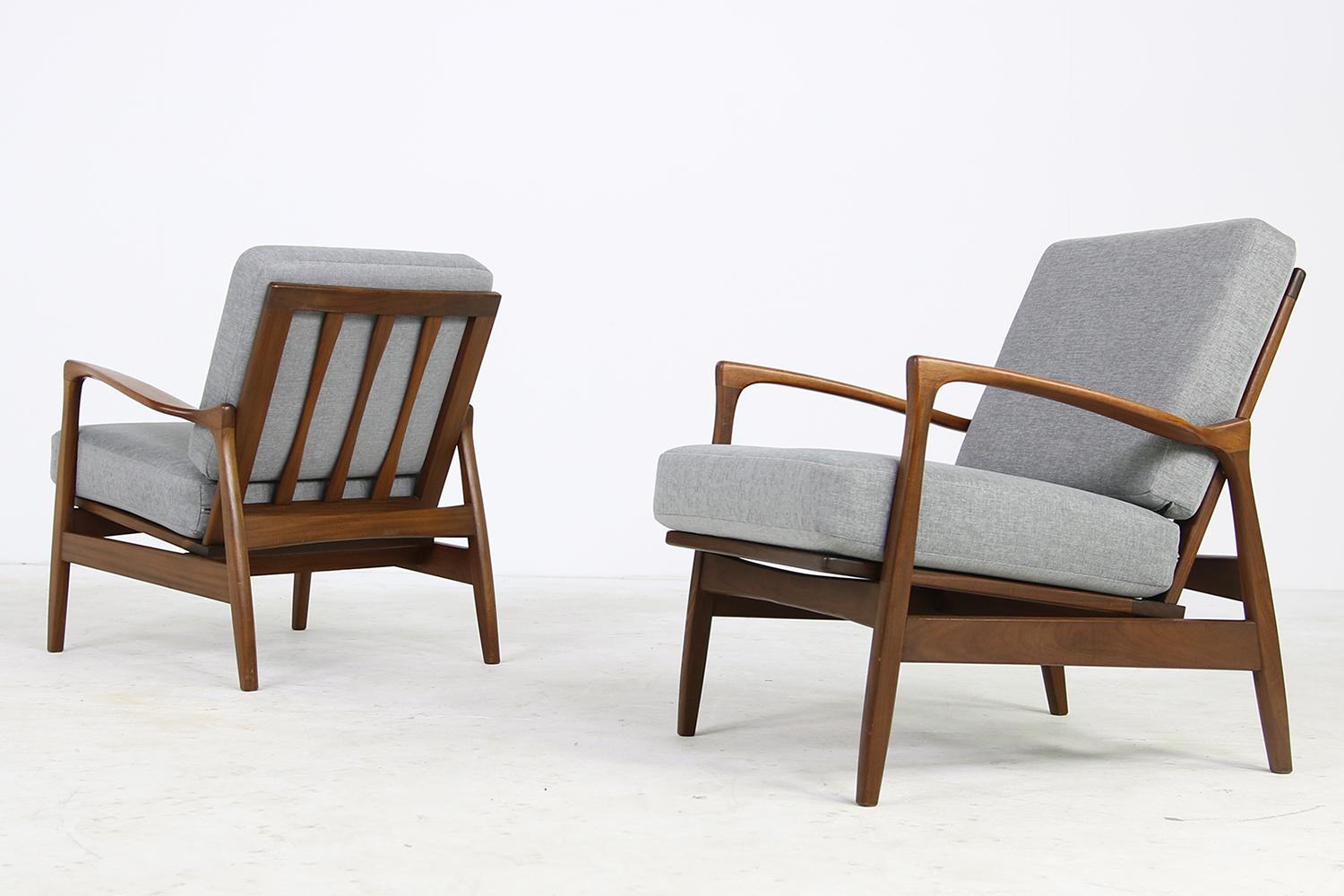 Beautiful pair of 1960s Danish easy chairs, organic shape, new upholstery, covered with new fabric, very rare models, solid wood, fantastic condition, pretty rare pieces.