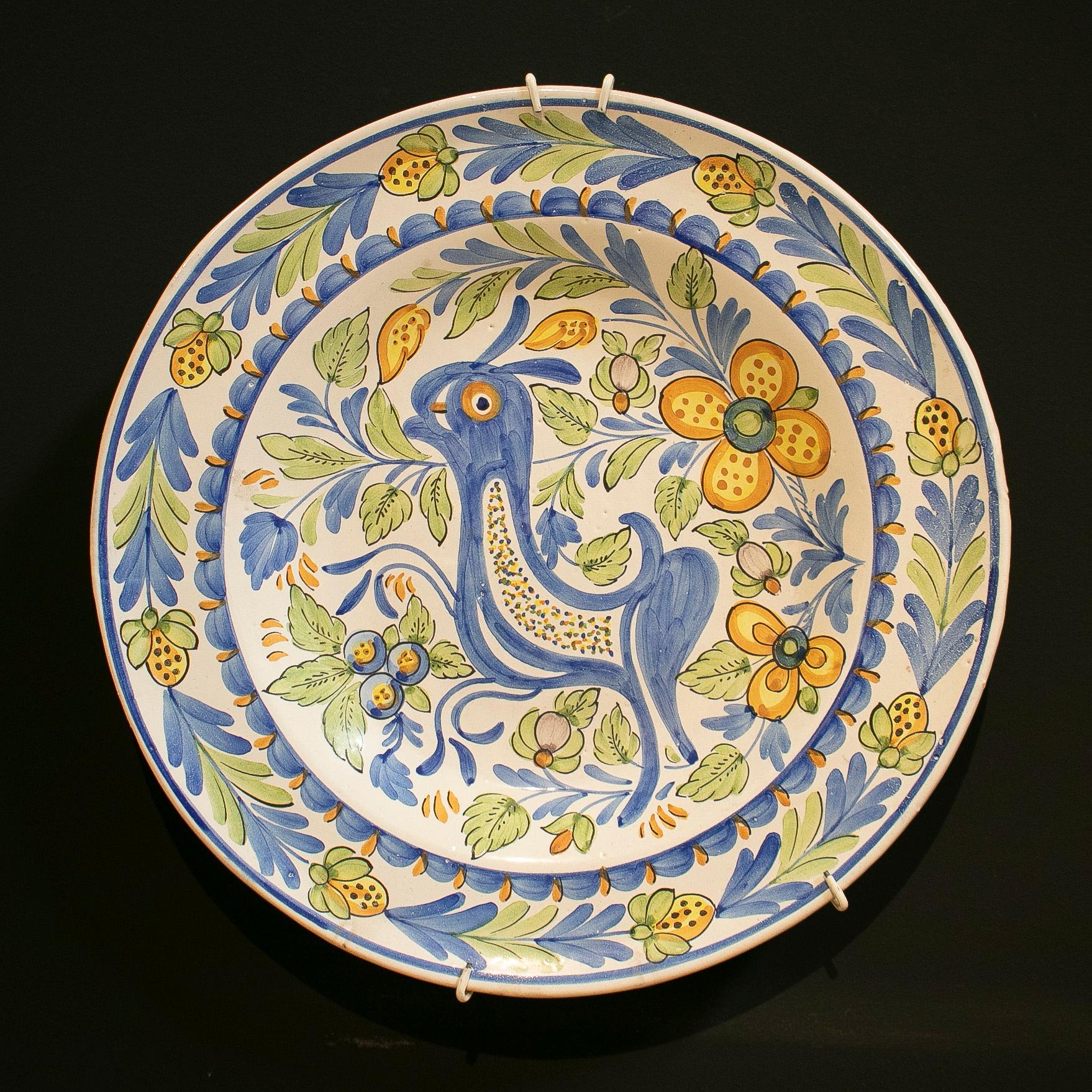Pair of 1960s Spanish painted glazed terracotta ceramic plates.