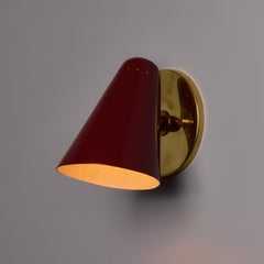 Pair of 1960s Stilnovo Perforated Red Metal and Brass Articulating Sconces