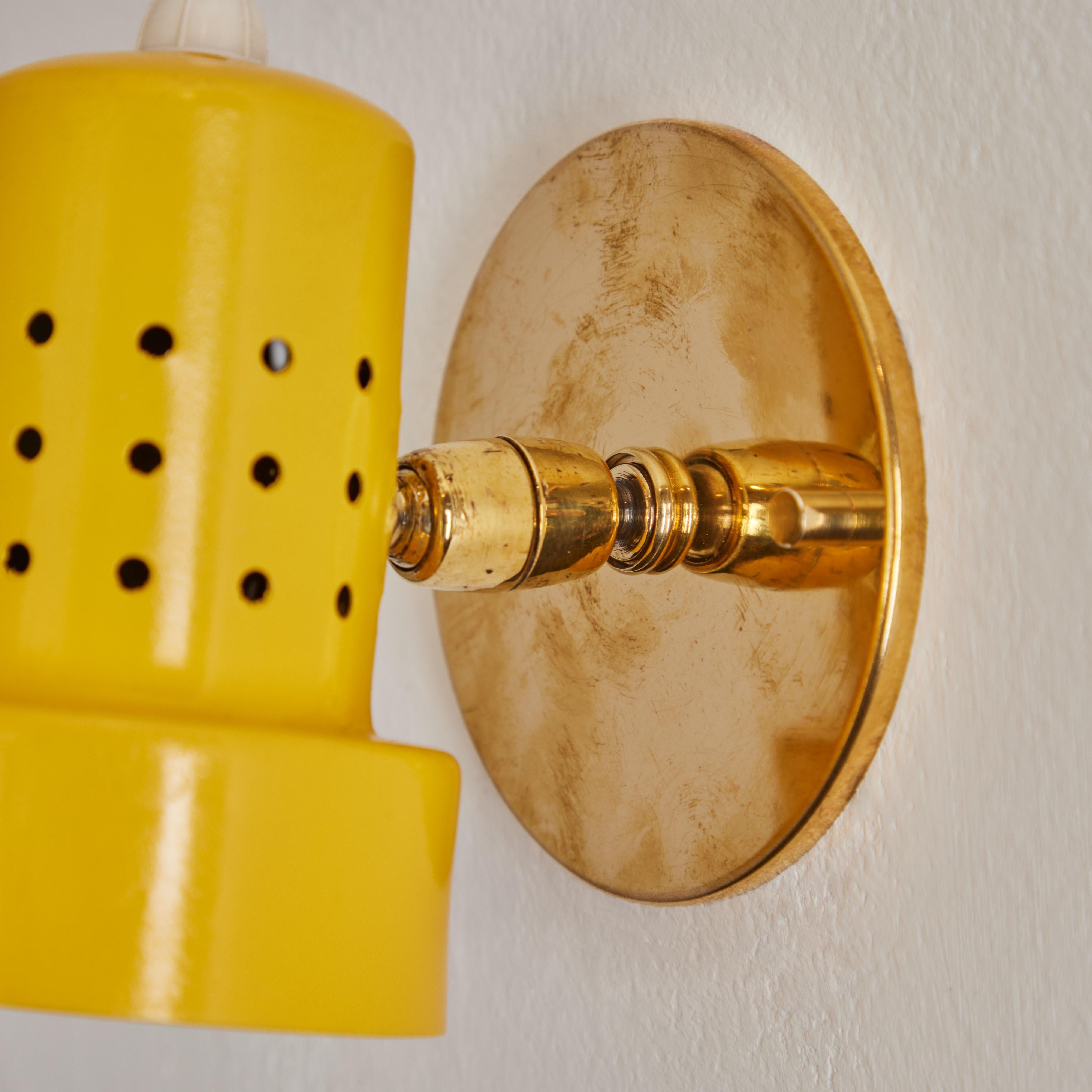 Pair of 1960s Stilux Milano Perforated Yellow Articulating Sconces For Sale 1
