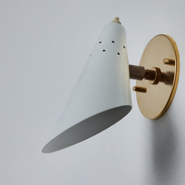 Pair of 1960s Stilux Milano White Perforated Metal Articulating Sconces