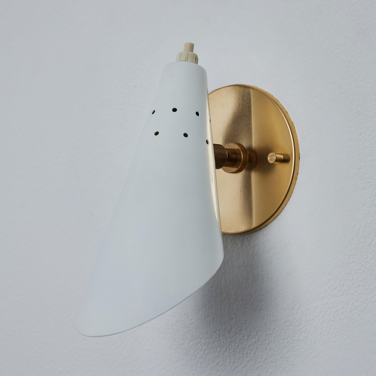 Pair of 1960s Stilux Milano White Perforated Metal Articulating Sconces