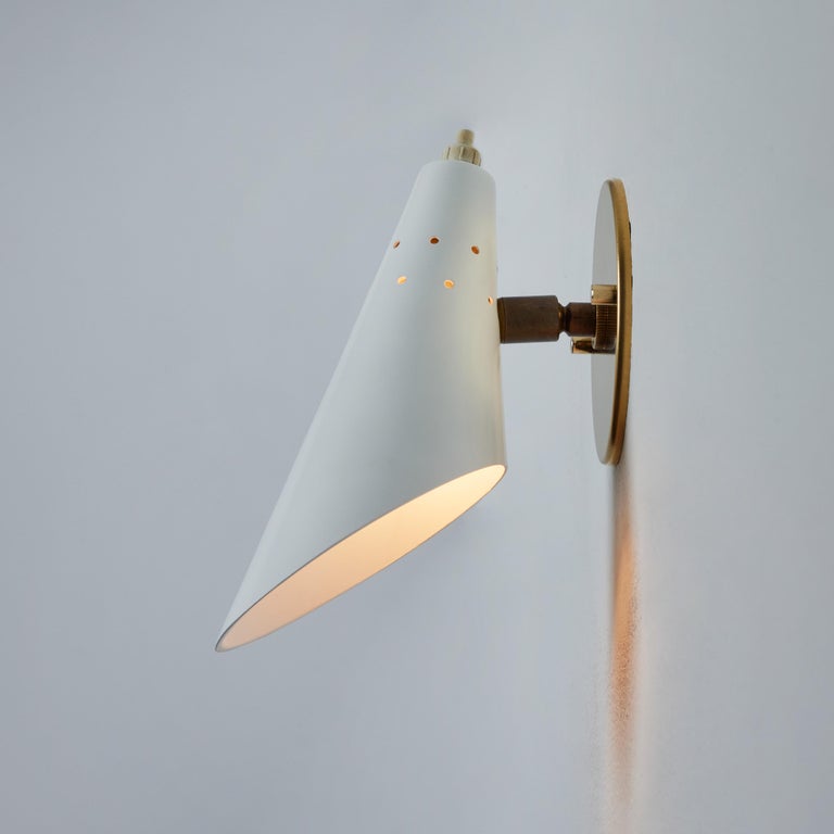 Pair of 1960s Stilux Milano White Perforated Metal Articulating Sconces