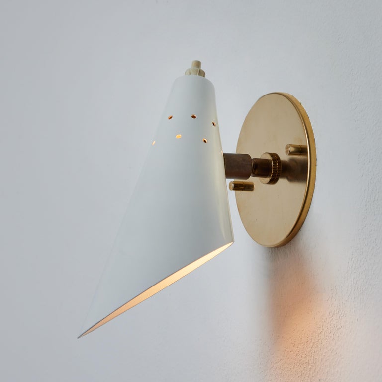 Pair of 1960s Stilux Milano White Perforated Metal Articulating Sconces