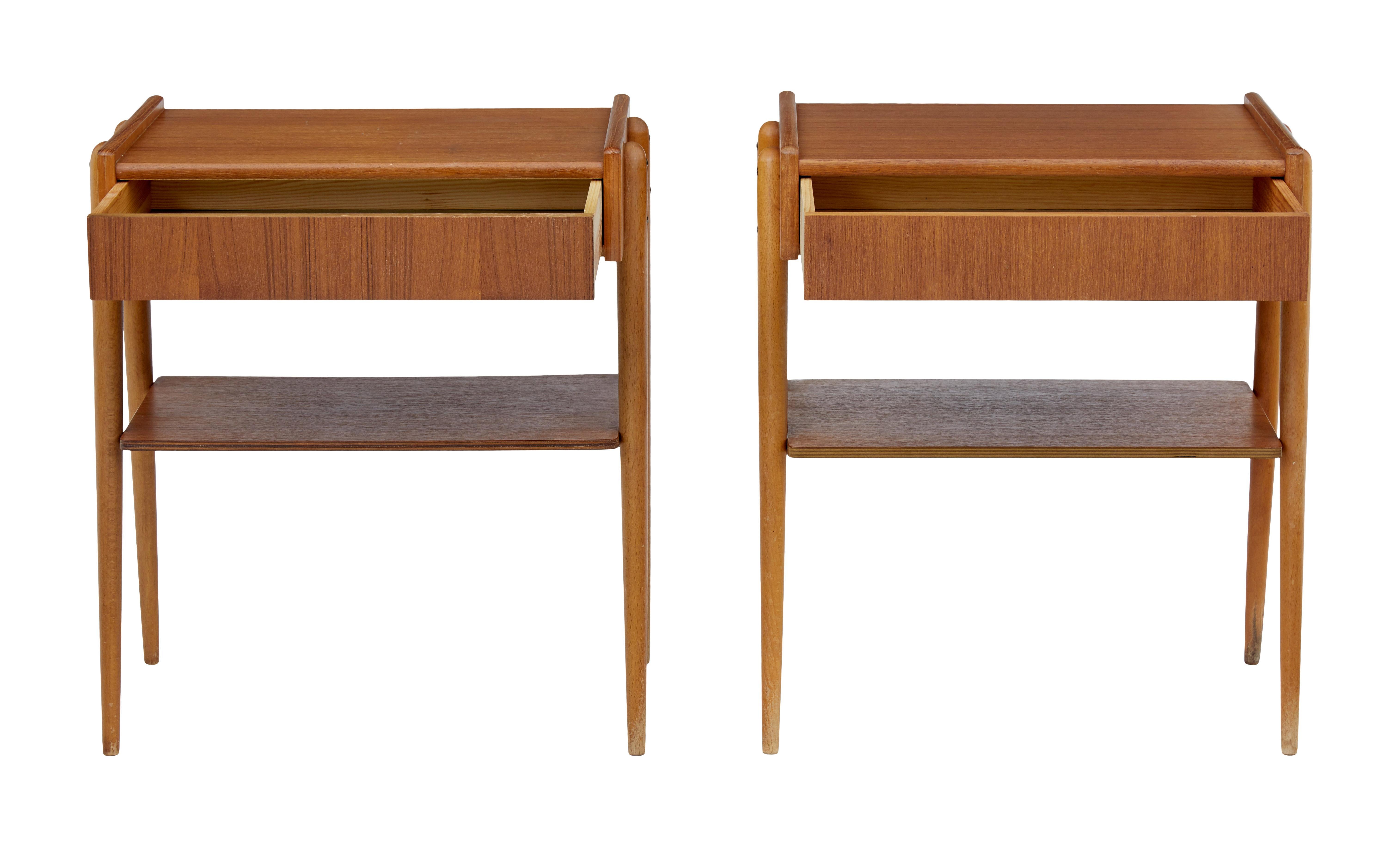 Pair of Danish teak bedside tables, circa 1960.

Single drawer to the front, which opens from the bottom so not to spoil the design. Solid teak leg frames which allows a single shelf to fit between the legs.

Minor surface marks and fading to