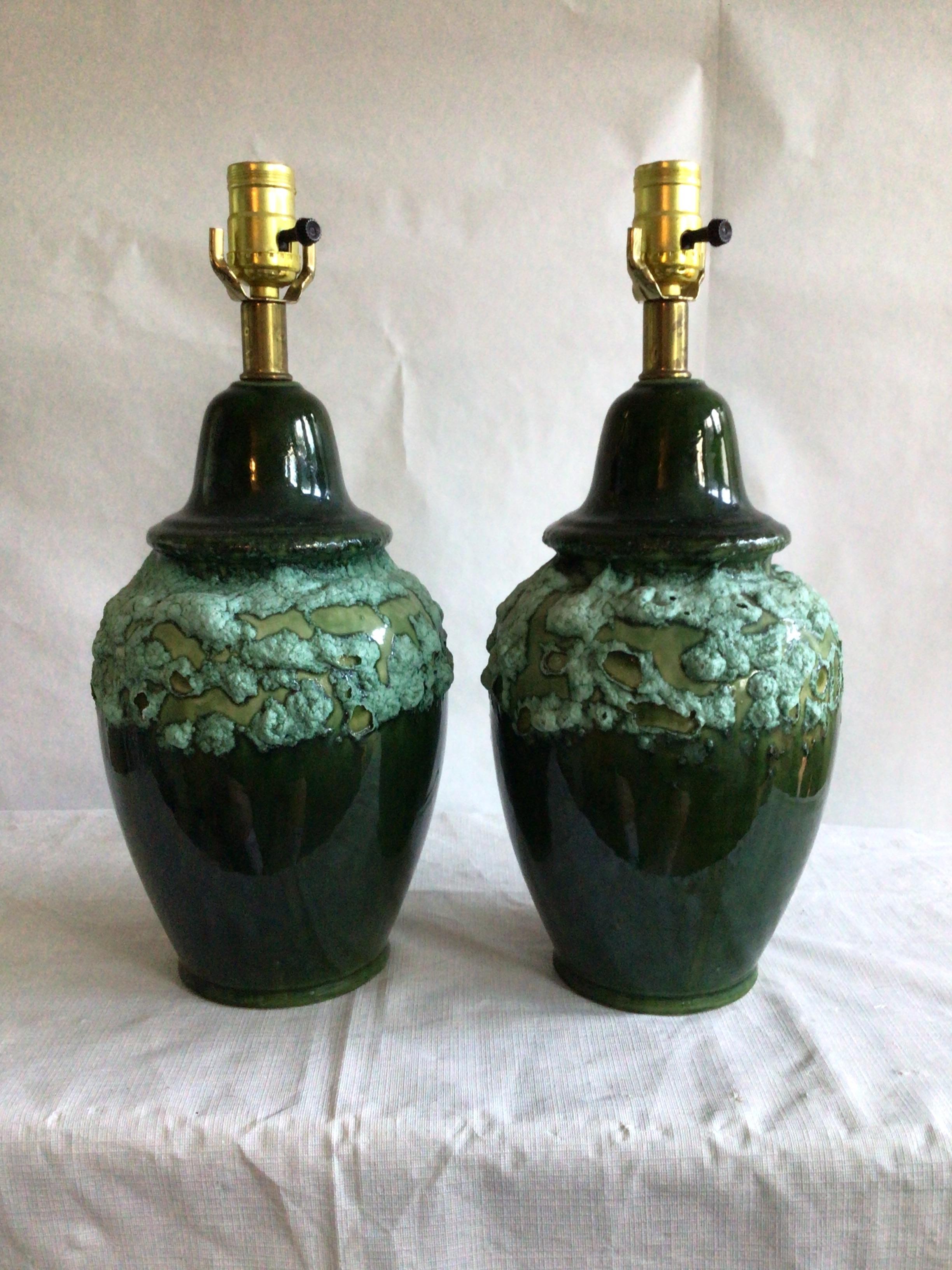 Pair of 1960s Textural Green Drip Glazed Lamps
Colors: Light greens from mint to moss are the textural accent combined with a darker drip glaze in a forest, pine, or darker green color
A perfect pair of lamps wherever light and a beautiful green