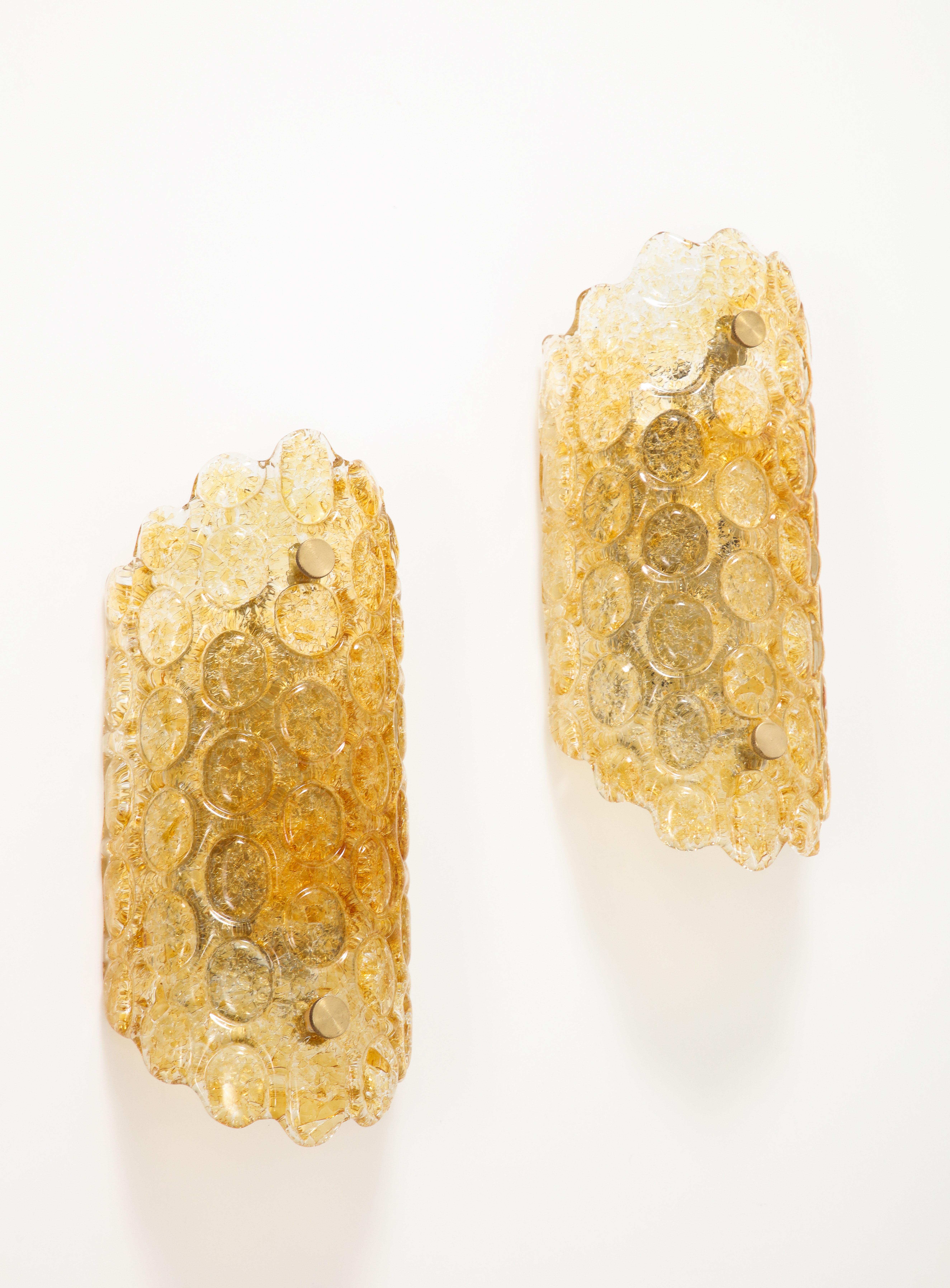 Pair of 1960's Textured Disc Glass Sconces in the style of Orrefors. In Good Condition For Sale In New York, NY