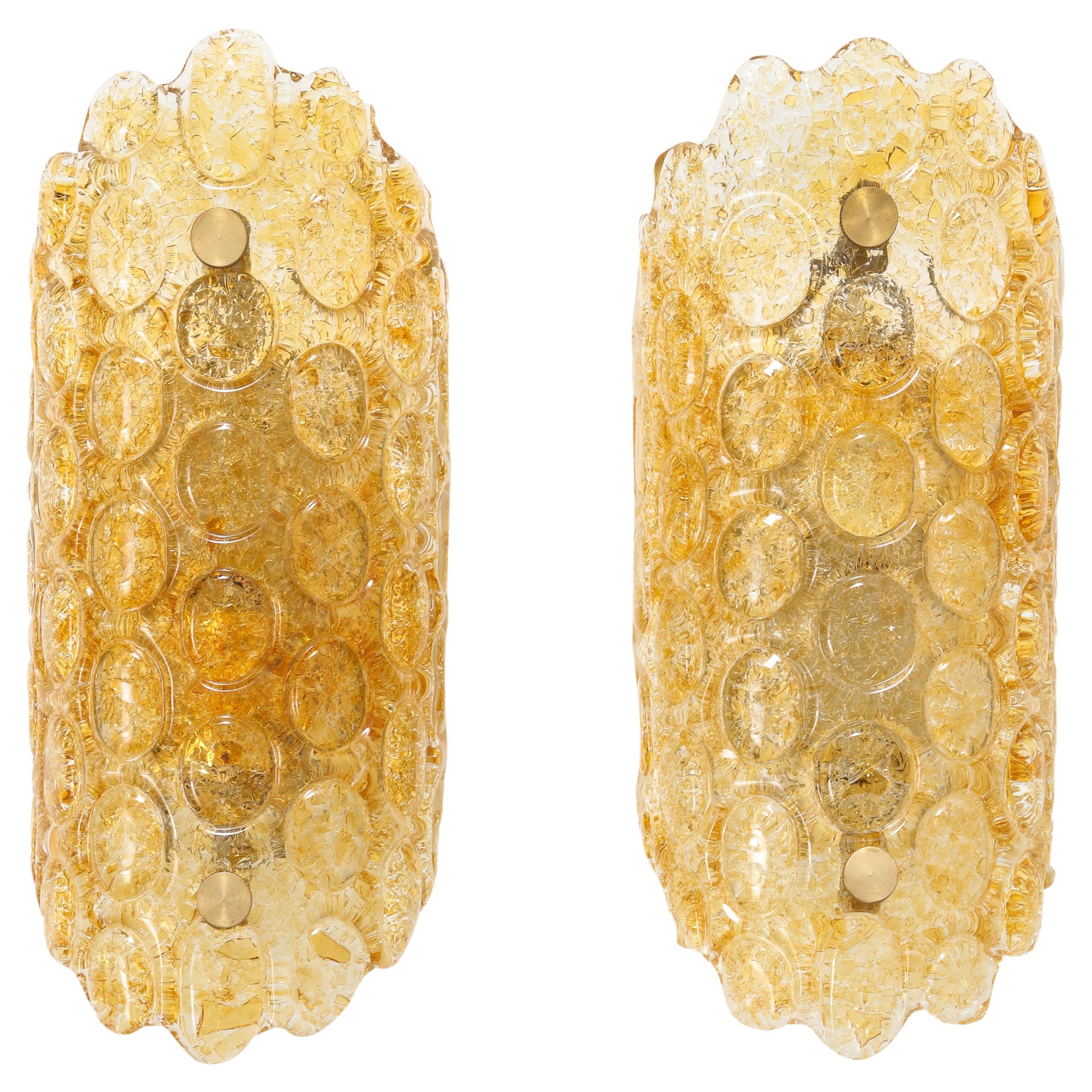 Pair of 1960's Textured Disc Glass Sconces in the style of Orrefors.