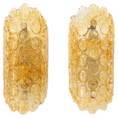 Vintage Pair of 1960's Textured Disc Glass Sconces in the style of Orrefors.