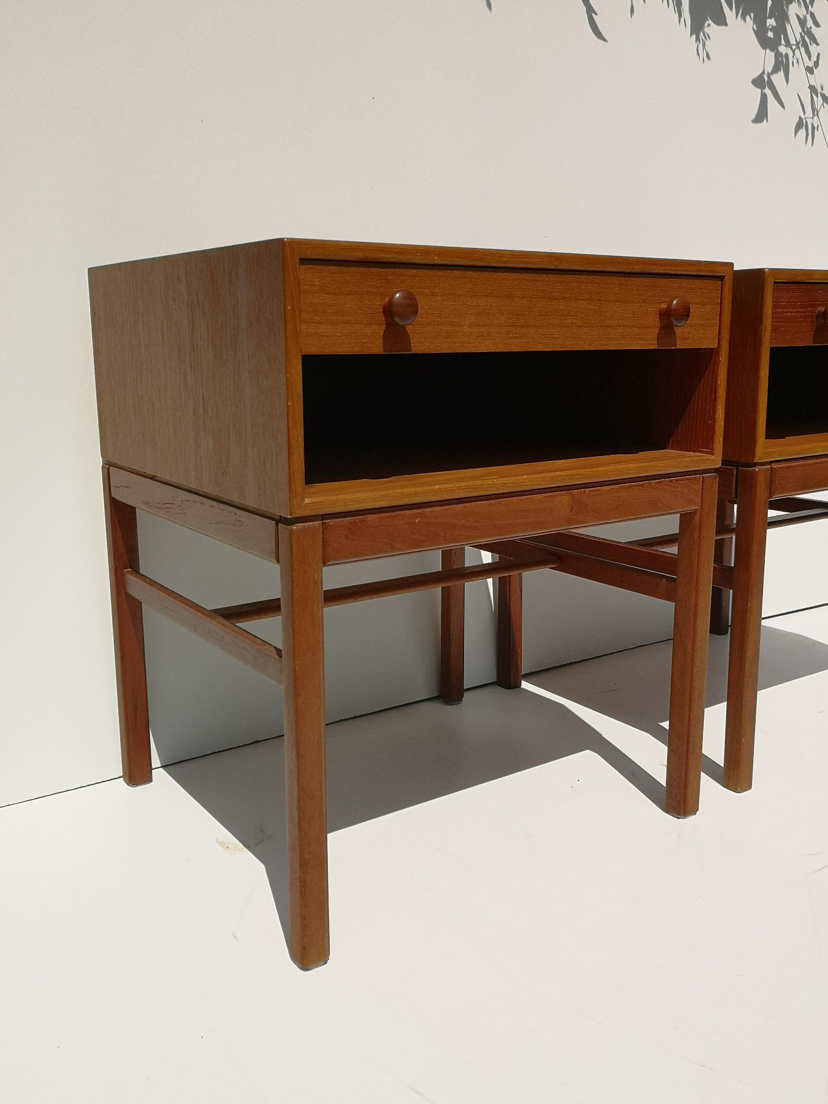 Pair of high quality Swedish teak nightstands / end tables, circa 1960s. Designed by Sven Engström and Gunnar Myrstrand, each piece features solid wood dovetailed drawer fronts, lots of storage, and is finished on all sides. Exceptional original