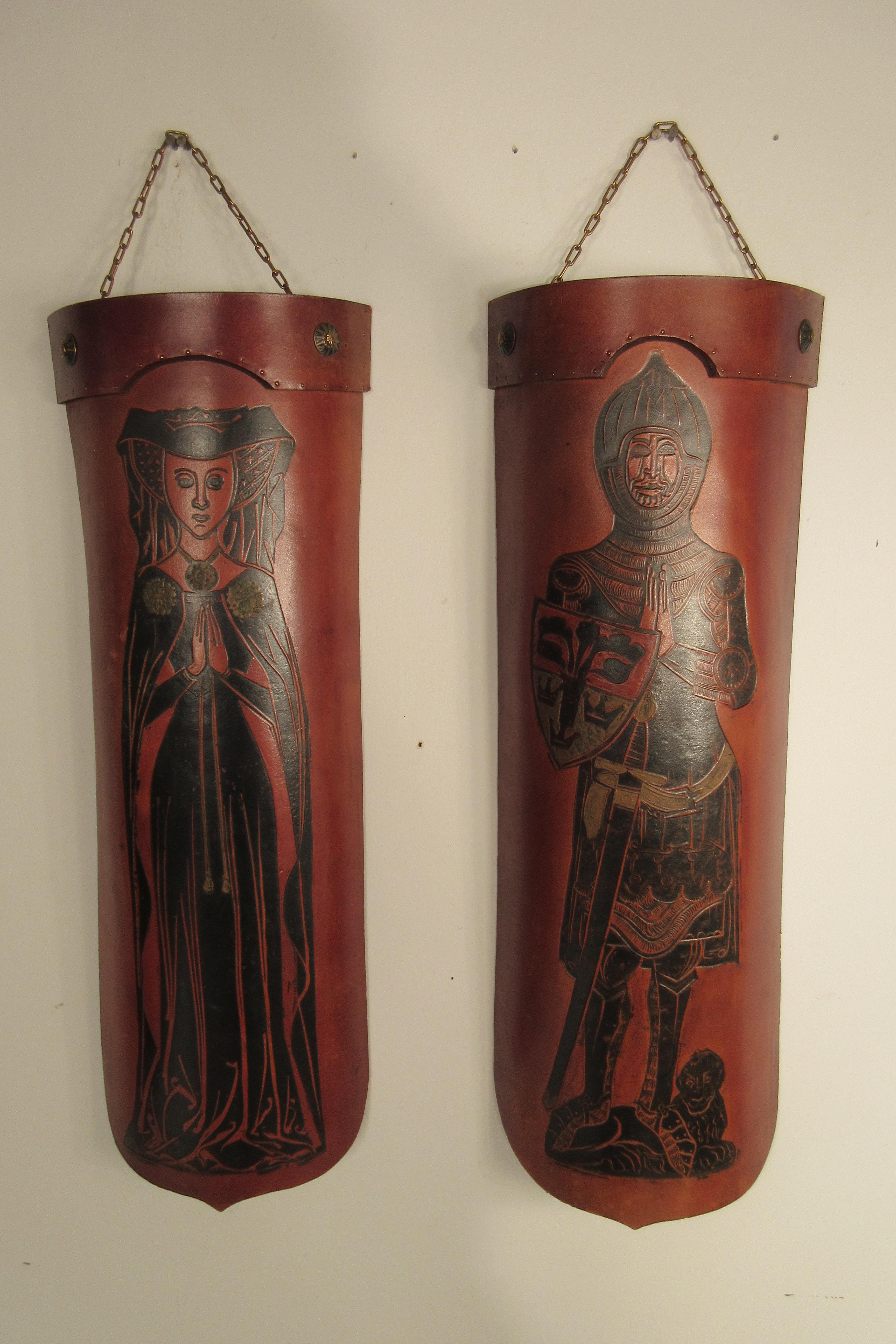Pair of 1960s Tooled Leather Mid Evil Curved Wall Plaques In Good Condition For Sale In Tarrytown, NY