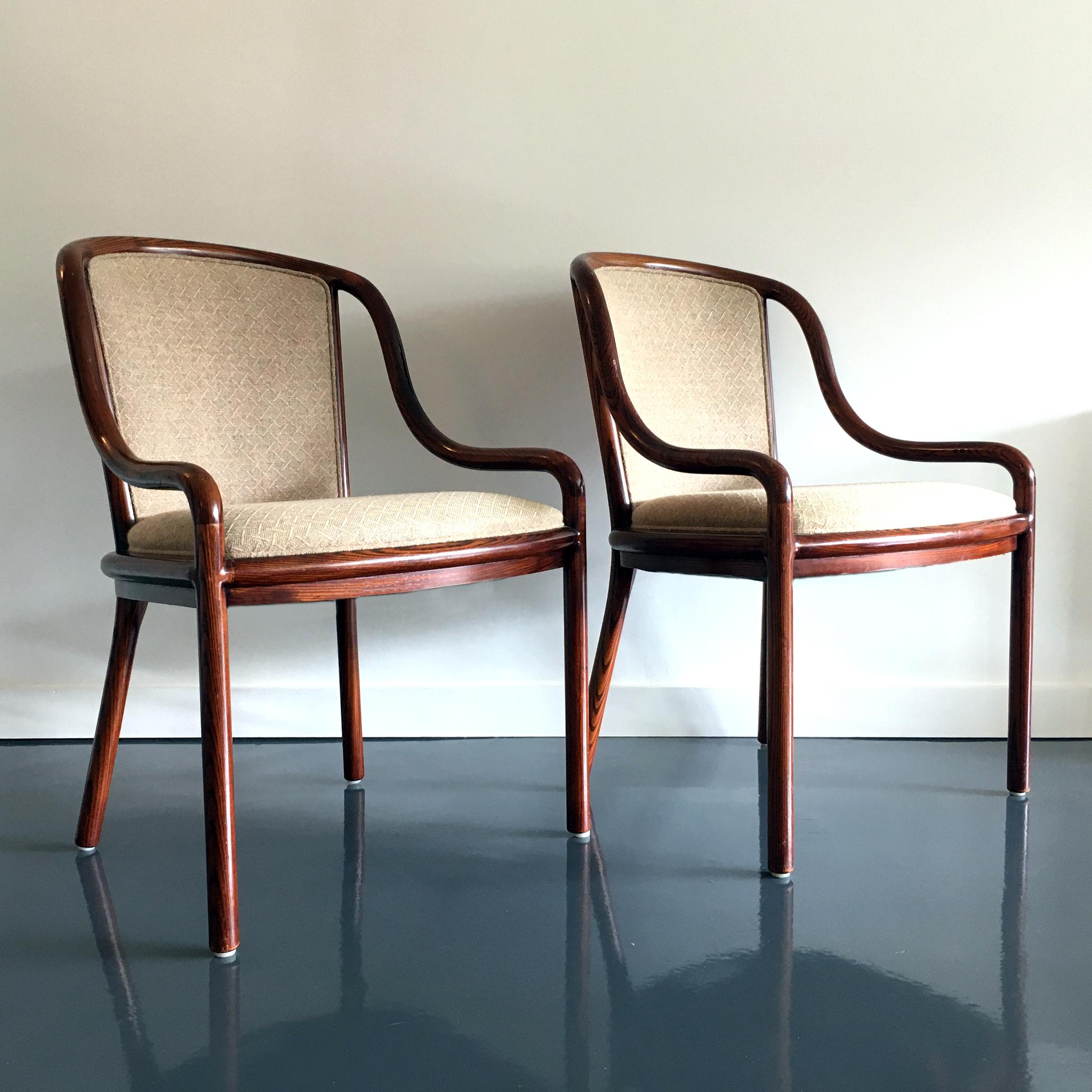 Designed by Ward Bennett for Brickel Associates, elegant armchairs. Made from ash wood and stained in a walnut finish. Marked with makers tag. Sold as a pair.
