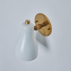 Pair of 1960s White Perforated Wall Lamps Attributed to Jacques Biny