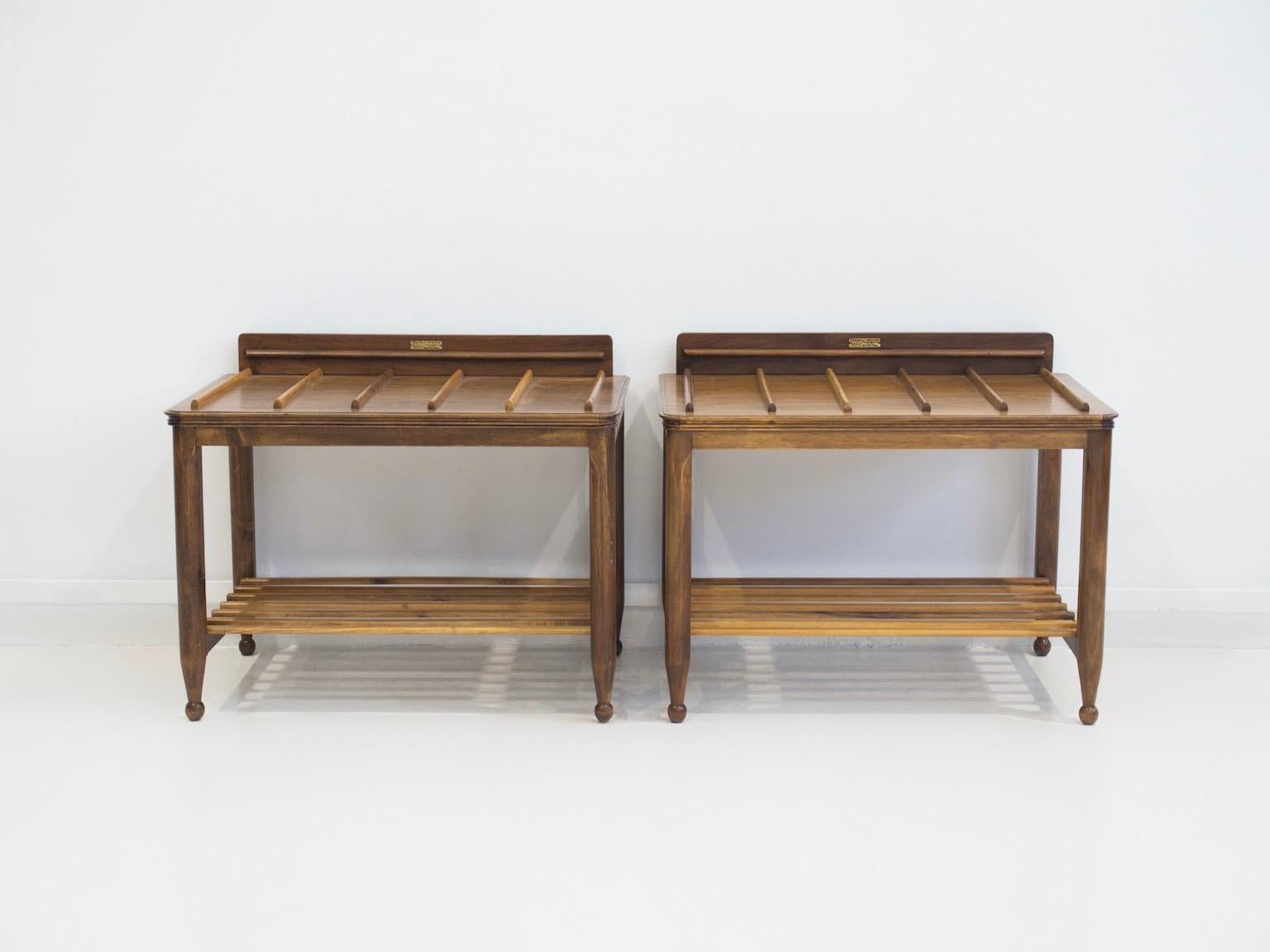 Two luggage racks from the 1960s. Made of lacquered wood. Manufactured and labeled by Fratelli Strada.