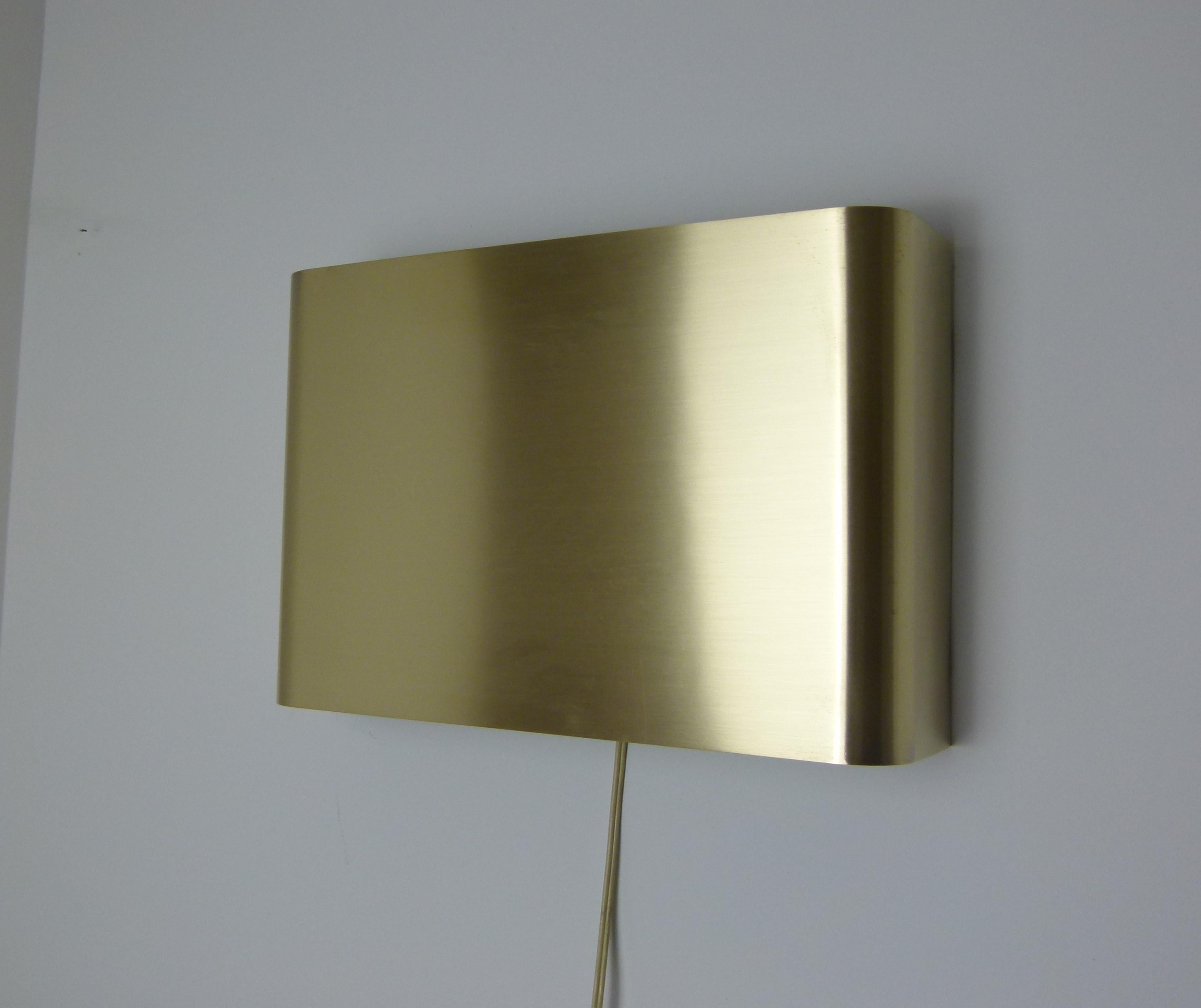 Pair of rectangular brushed brass sconces, double light.
French work of Maison Charles, circa 1970-1975
Signed Charles Made in France
New wiring to EU standards, works for US standards.
Adapters will be provided for US bulb
Perfect