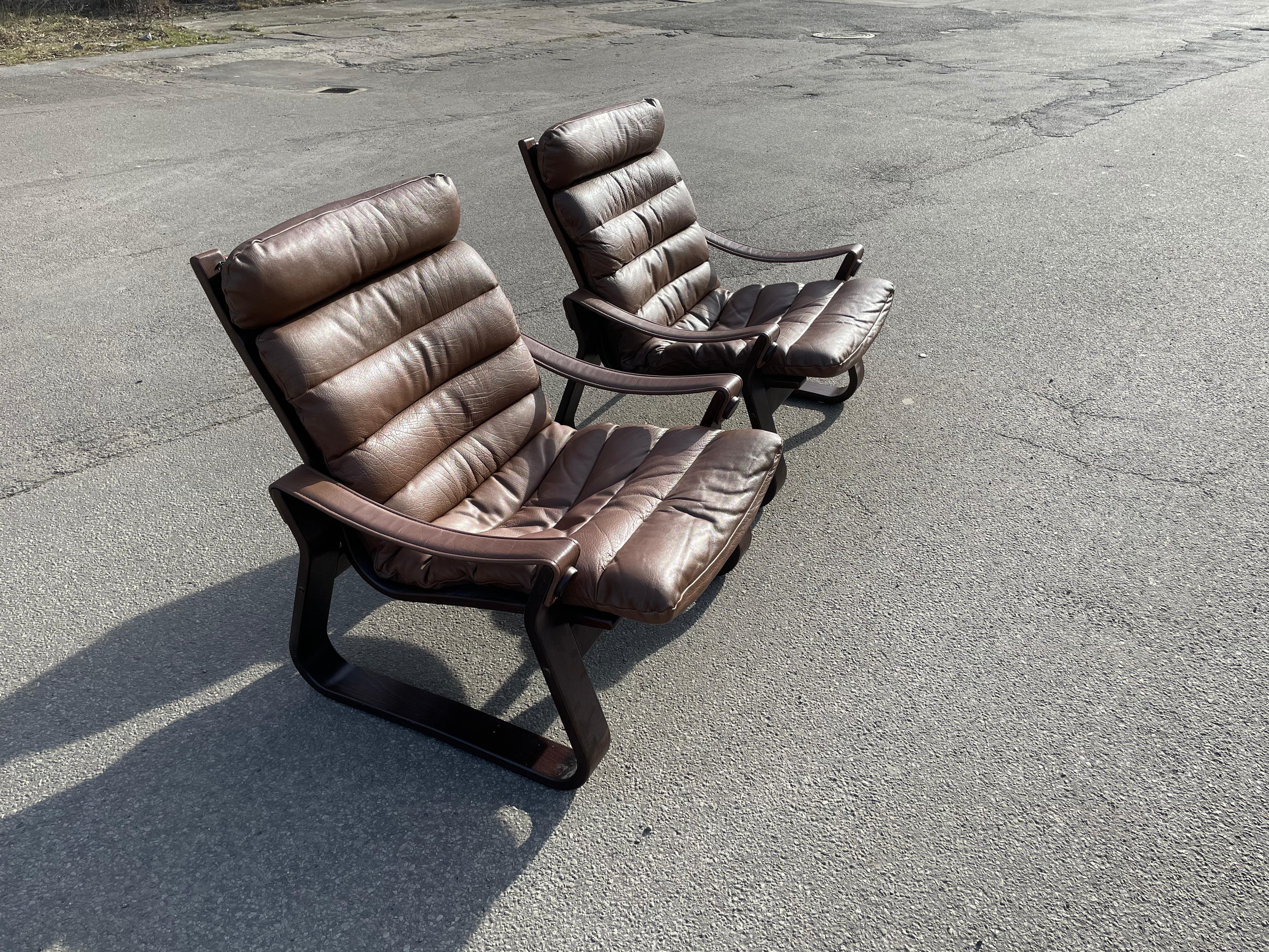 A set of Danish midcentury lounge chairs, comfortable with an option of adjusting seat position. A vintage in super condition.