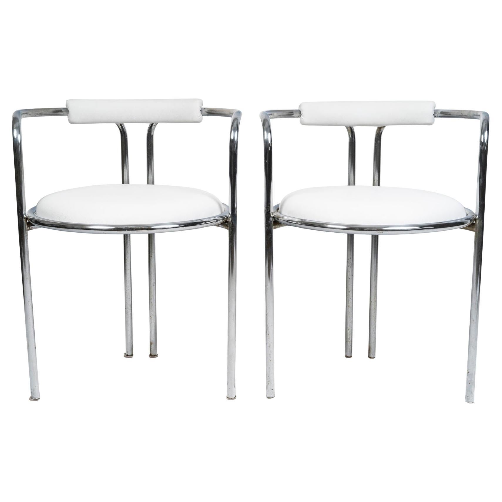 Pair of 1970s Armchairs in Chrome-Plated Metal and Imitation Leather.