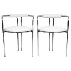 Pair of 1970s Armchairs in Chrome-Plated Metal and Imitation Leather.