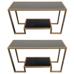 Pair of 1970
s Art Deco Black Glass and Brass Consoles Pair of 1970
s Art Deco Black Glass and Brass Consoles