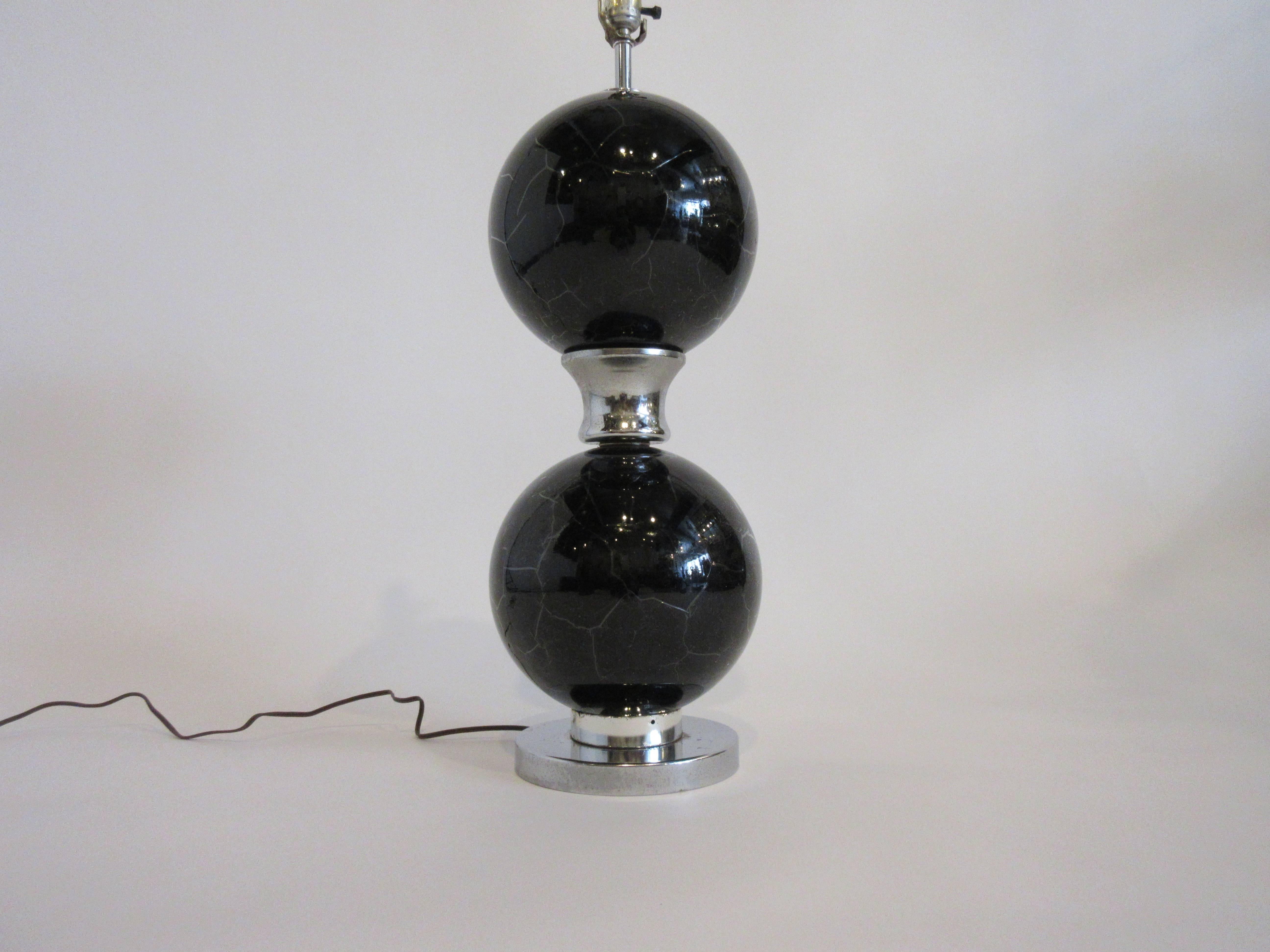 Pair of 1970s black and chrome crackled glass lamps.