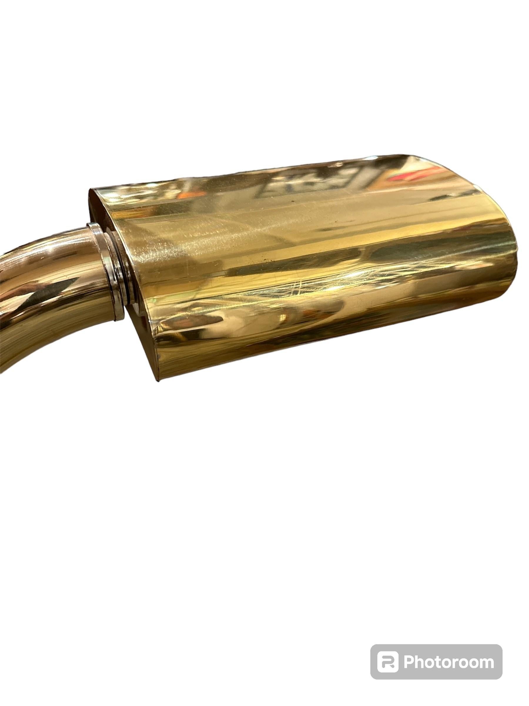 Jim Bindman was known for his iconic designs, and the Rainbow Lighting Company produced some spectacular pieces as well. A pair of groovy brass floor lamps in the style of Jim Bindman would surely be a stylish and eye-catching addition to any room.