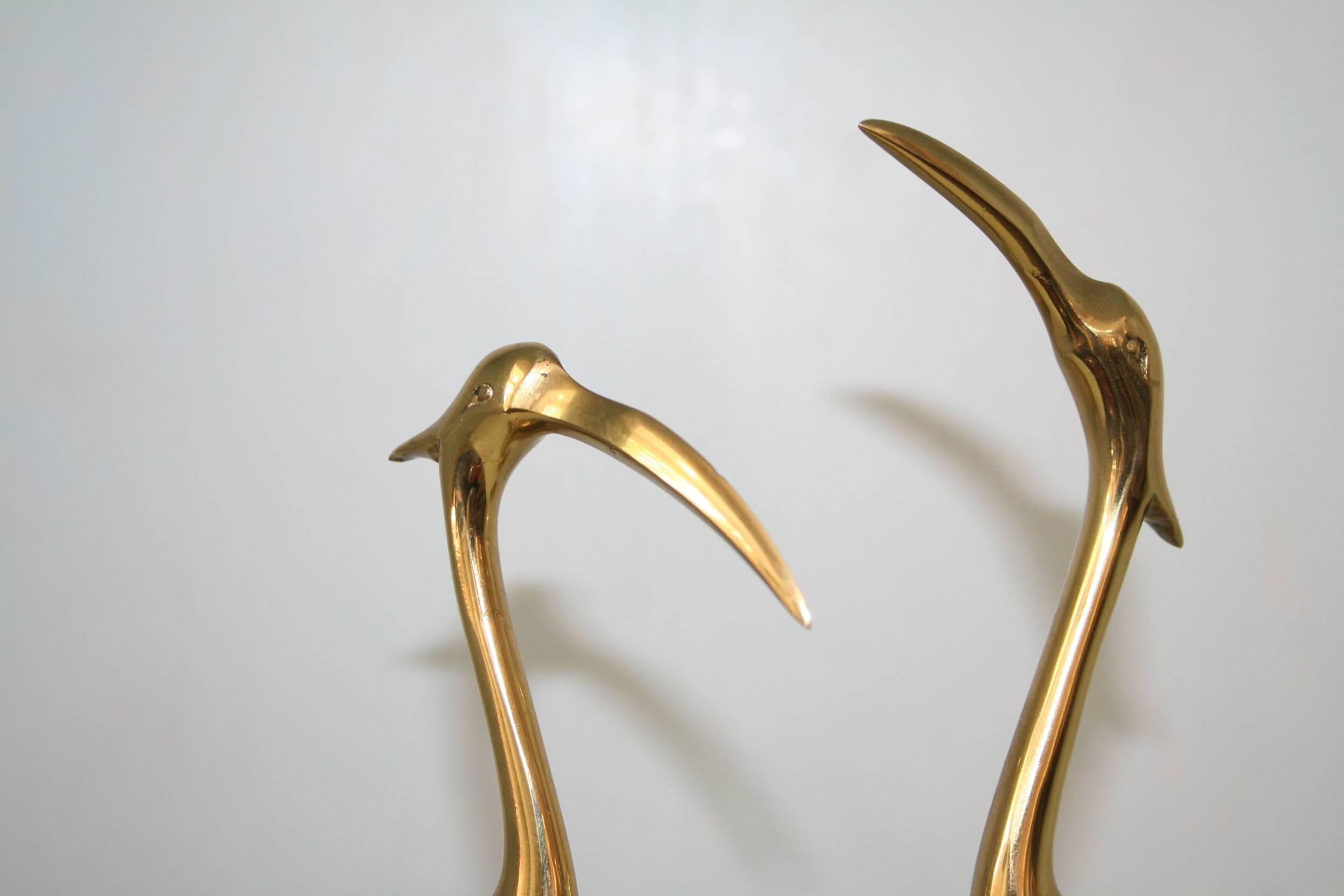 Pair of 1970s brass herons in excellent condition perfect to pace on top of a table or bookcase.