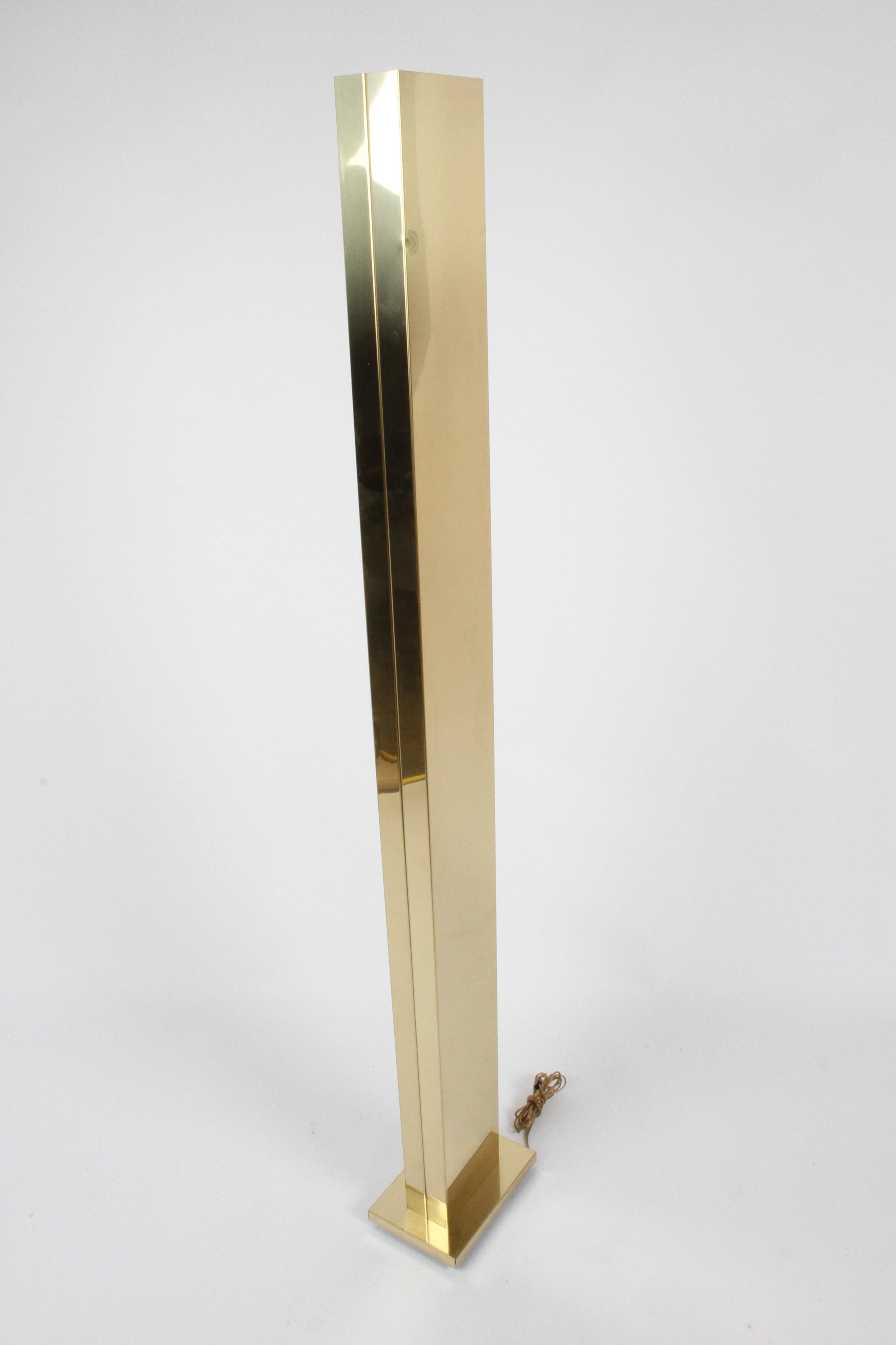 Pair of architectural form brass monolith skyscraper Hologen torchiere floor lamps by Casella Lighting San Francisco. One owner, in very nice original condition, two small dings to back of one lamp. In working order, were plugged into an outlet that