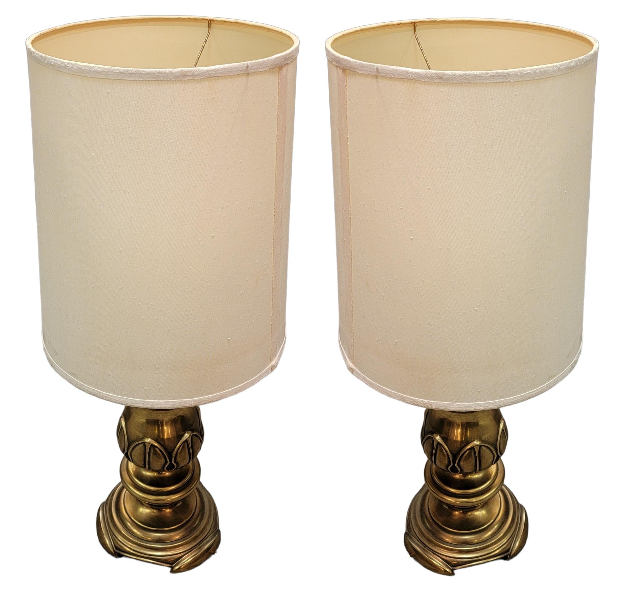 Pair of Bronze Stifle Table lamps with linen lamp shades. The base is a nice thick base that offers stability. The weight of the lamps matches the size. Each bronze table lamp is tested and found in working order.