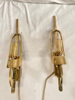 Pair of 1970's Brutalist bronze sconces