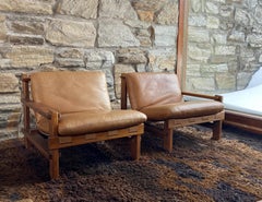 Pair of 1970's Carl Straub Brutalist pine and leather lounge chairs - loveseat