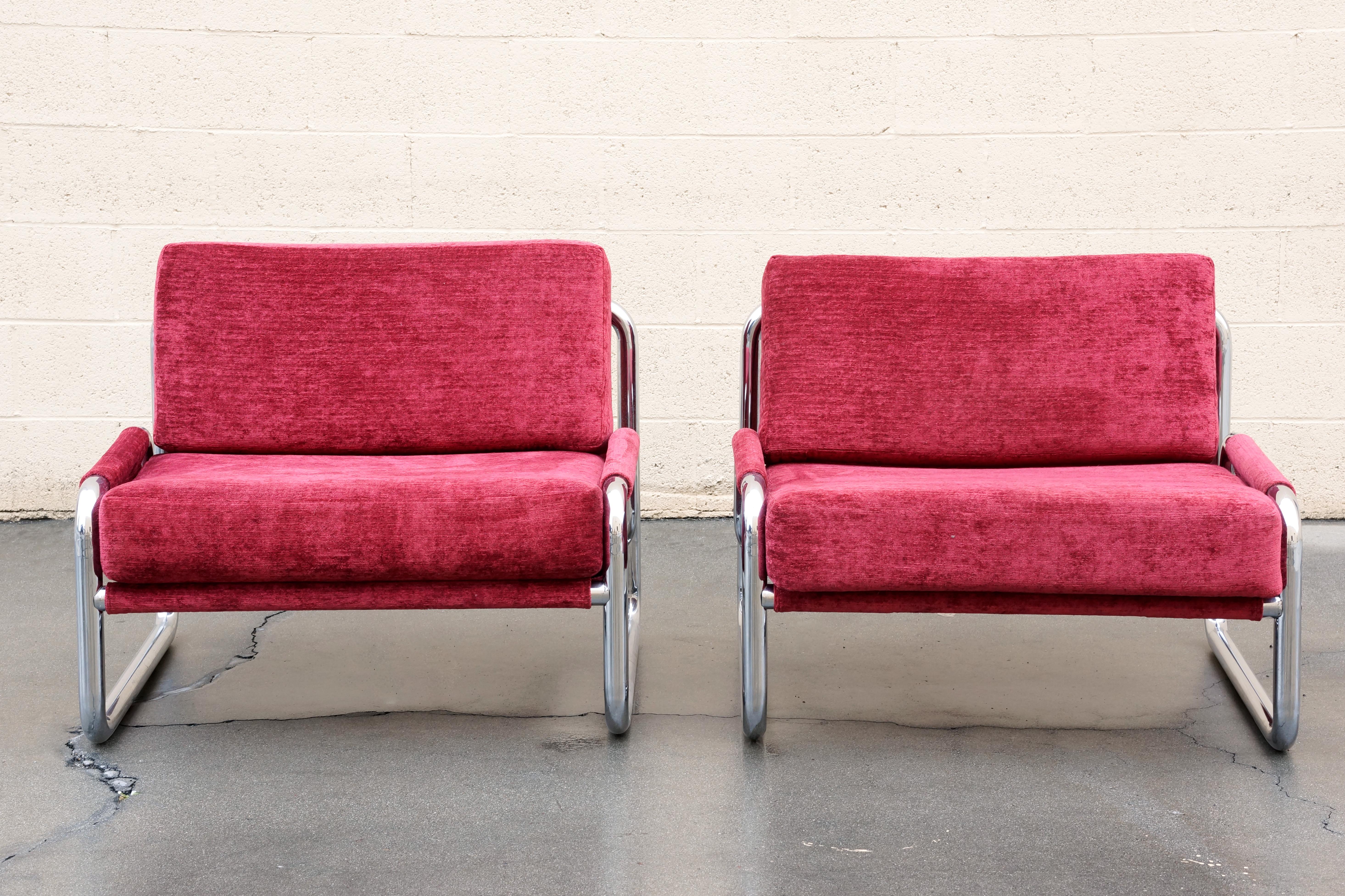 Outstanding pair of tubular chrome sling chairs in the style of Jerry Johnson, early 1970s. Features 3