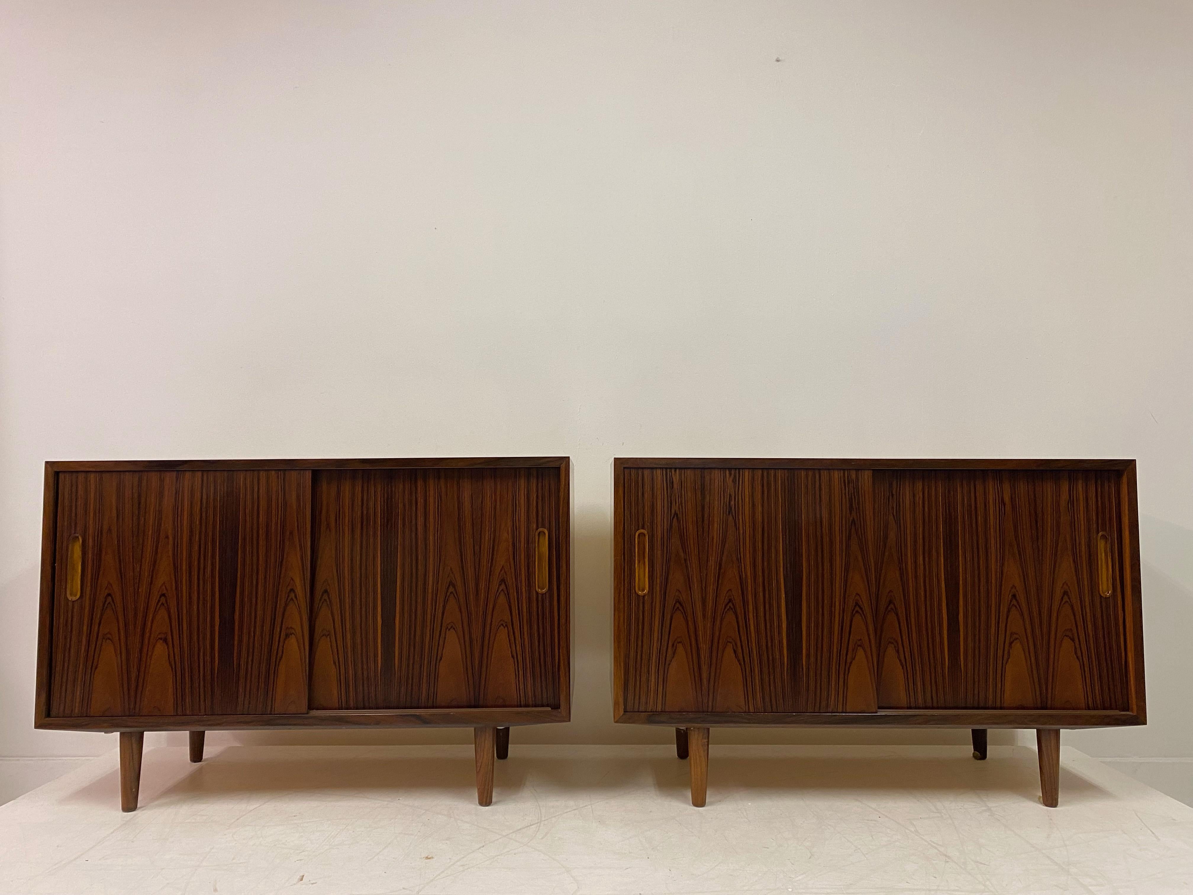 Pair of cabinets

By Poul Hundevad

Rosewood with lined interiors

Sliding doors

Denmark 1960s/1970s.
 
