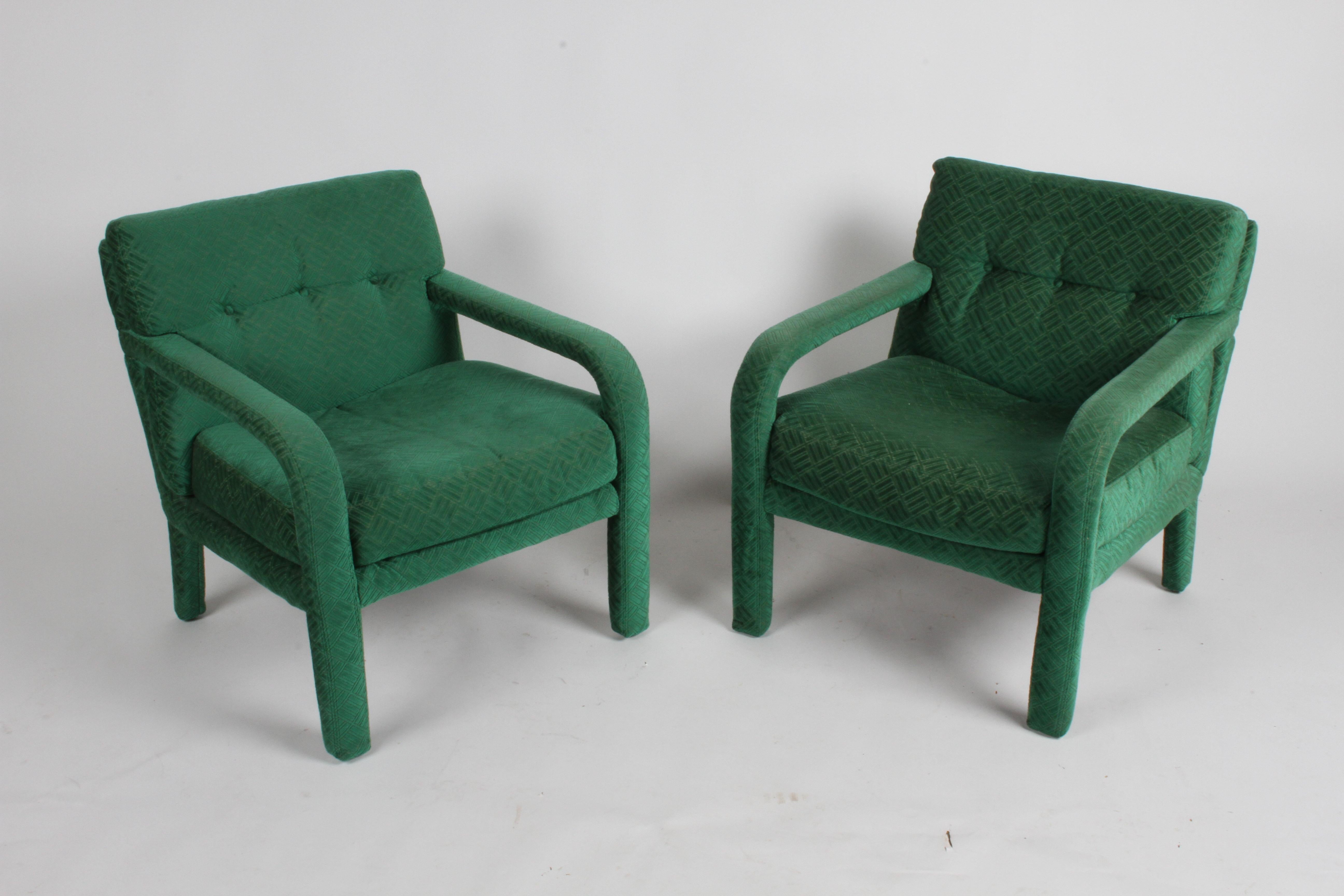Vintage pair of Directional circa 1970s fully upholstered lounge chairs with arms, in the original emerald green textured upholstery. One chair shows more wear than the other, very comfortable, foam is good. Labels to underside Directional -