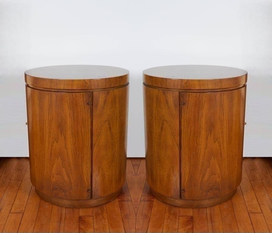 Incredible midcentury pair of cylinder cabinet side tables by Drexel Heritage, USA, circa 1970s. Refinished these wood side tables in the form of a drum. Contains a single hinged 