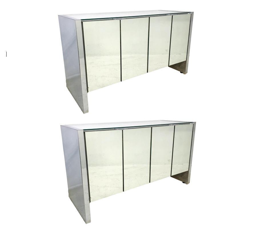 Pair of 1970s ello chrome and mirror cabinets/credenzas. Some minor issues with the metal and mirror but in overall great shape.