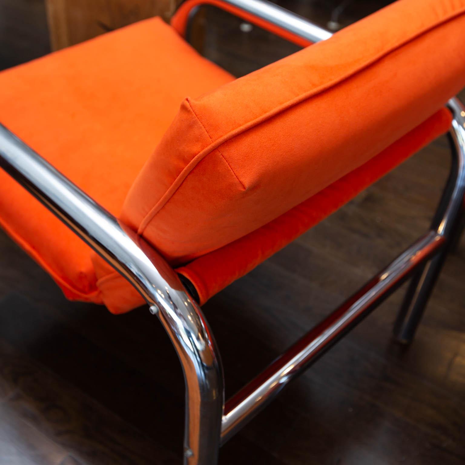 Reupholstered in a burnt orange ultra-suede, these Brady Bunch-era chairs would be great in a MCM themed room.