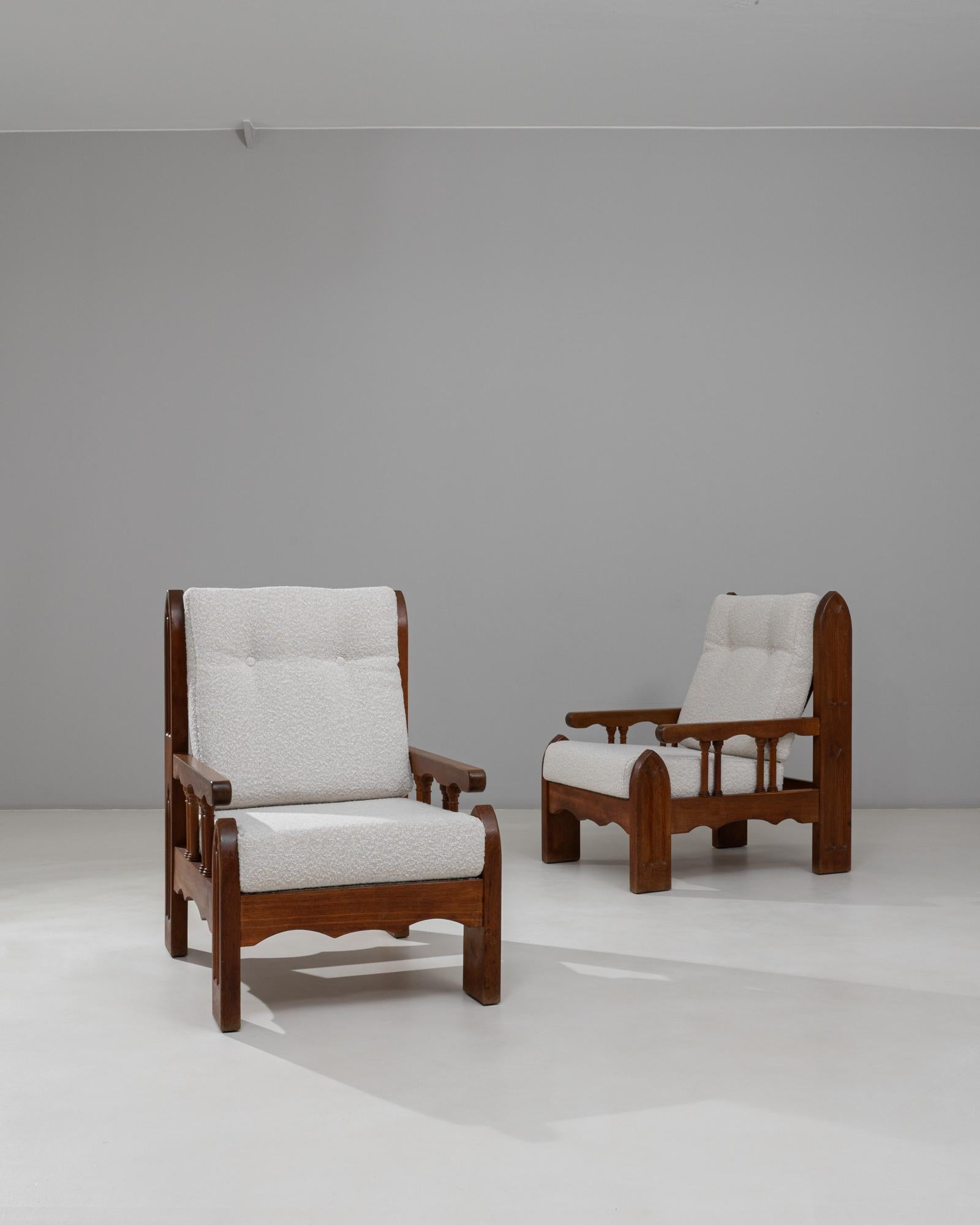 Pair of 1970s French Brutalist Upholstered Armchairs with Carved Details. These striking French armchairs embody the bold geometry and substantial presence characteristic of Brutalist design, softened by newly upholstered seats and backs in a