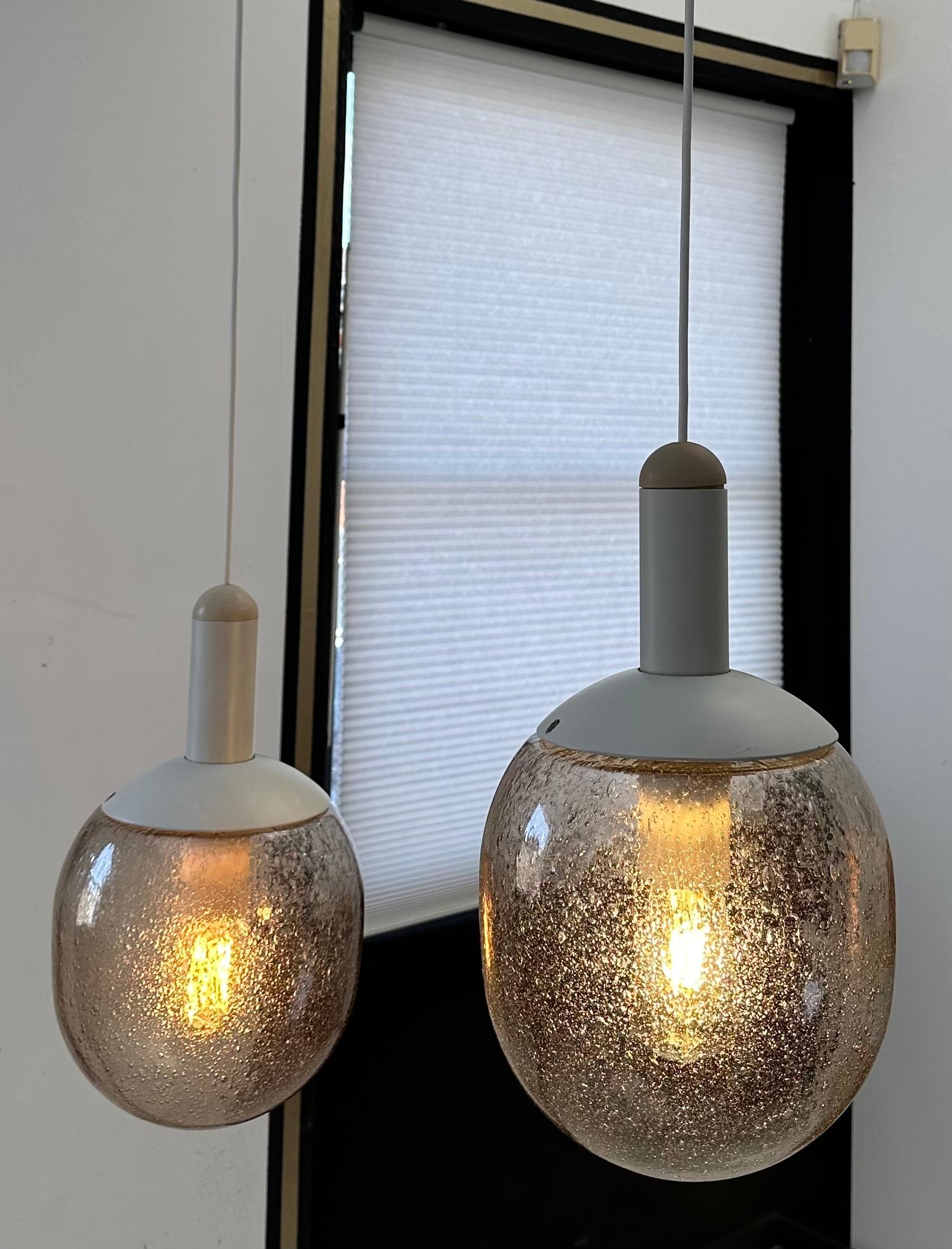 Hand-Crafted Pair of 1970s German Glashütte Limberg Bubbled Smoked Glass Pendant Lights For Sale