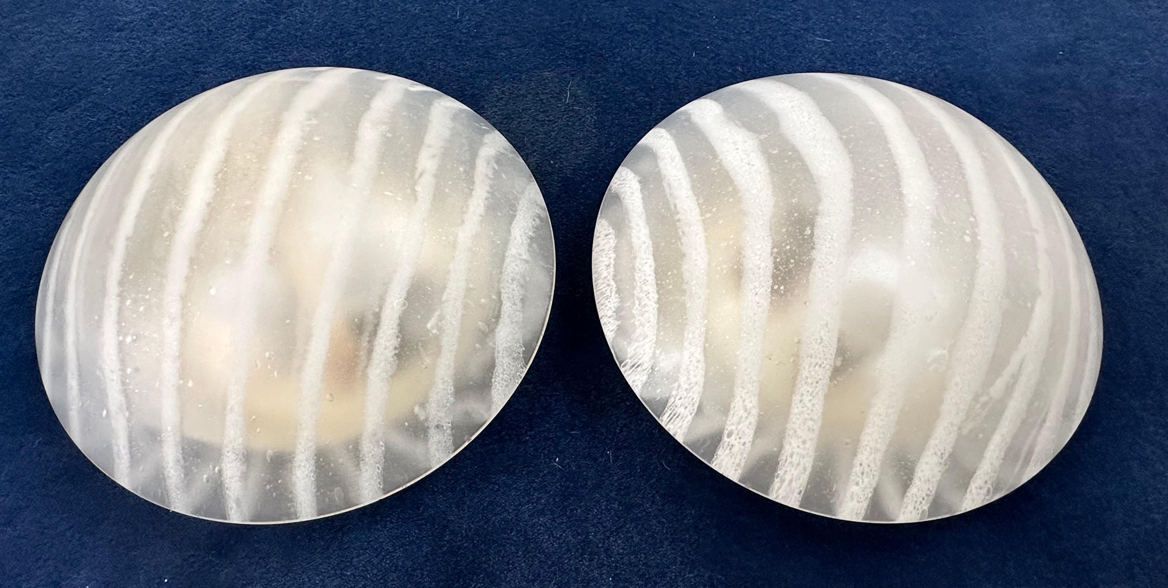 Pair of 1970s German Peill & Putzler Plafoniere space-age frosted glass with a swirled tripod pattern wall lights / sconces or flush mount ceiling lights. The frosted glass round shades screw onto the white lacquered metal bulb holder and are