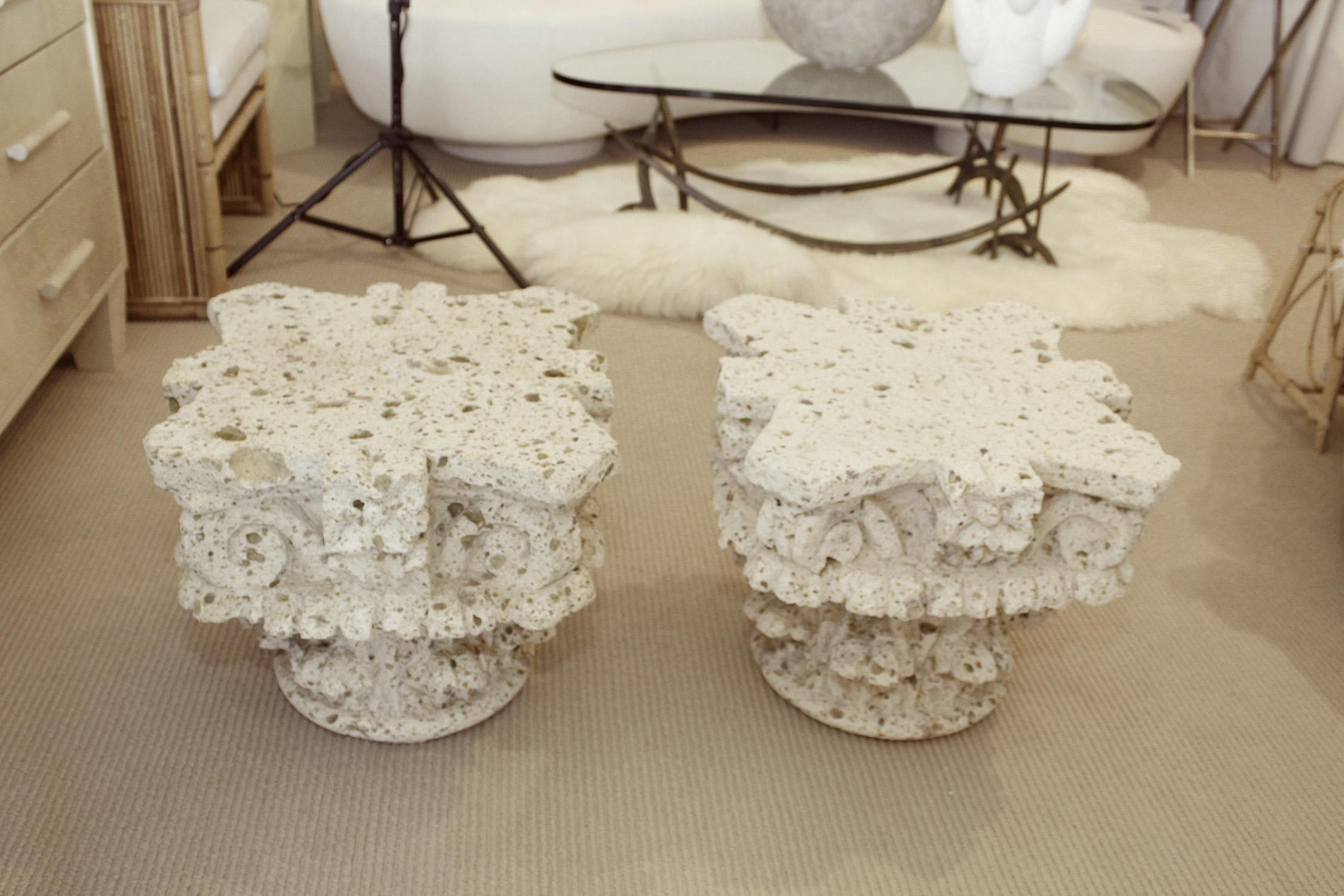 Pair of 1970s Palm Beach-chic side tables are Corinthian column capitals, hand-carved from blocks of limestone aggregate. Rustic and sophisticated.