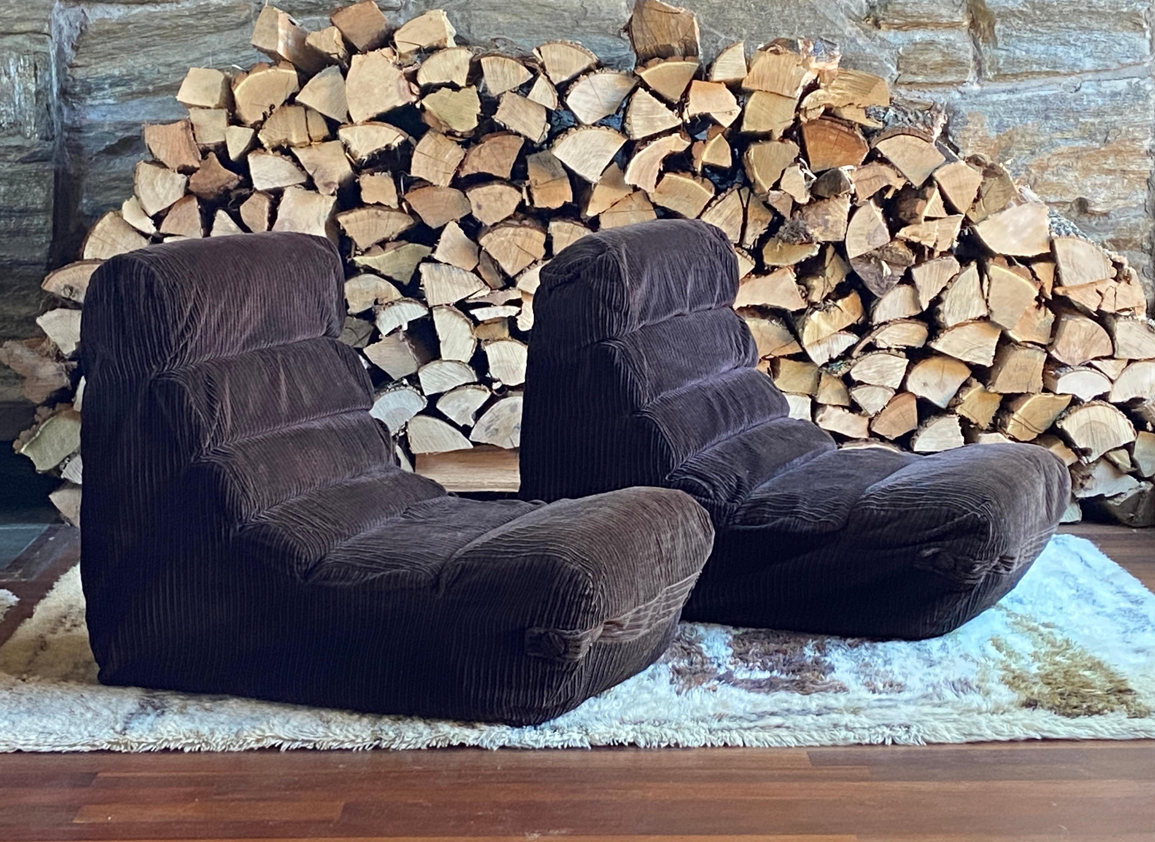 Great pair of 1970's brown corduroy modular lounge chairs - two pairs available, so potential to make a sectional sofa. Price is for a pair. Cool Space Age profile similar to some Ligne Roset designs like the Gilda sofa.  They are unmarked, although