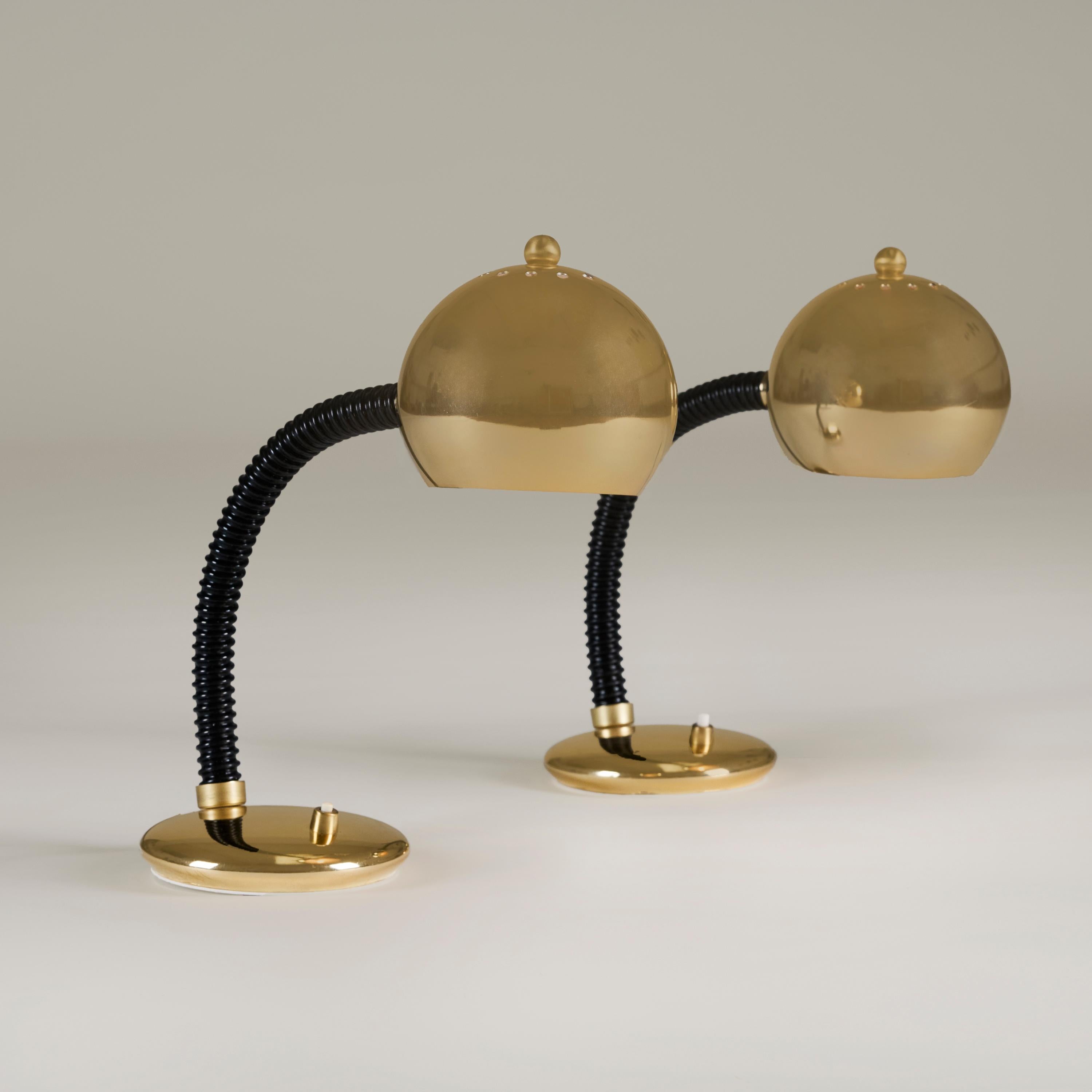 Practical and chic pair of desk lamps with adjustable arm, gold base with on/off switch and decorative domed shade. Very good vintage condition.