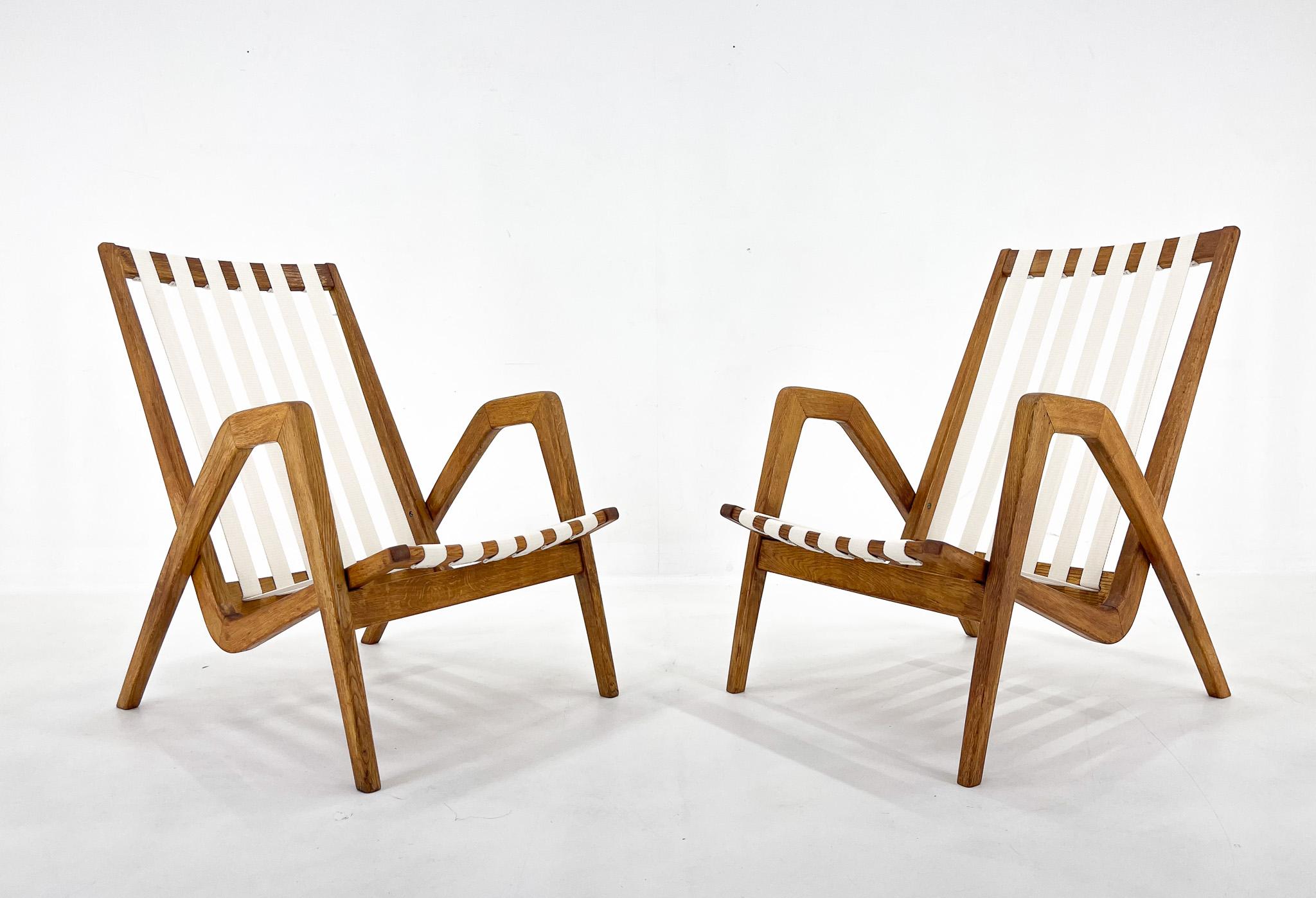 Set of two designer Armchairs by famous Jan Vaněk. Good original condition. New straps. 