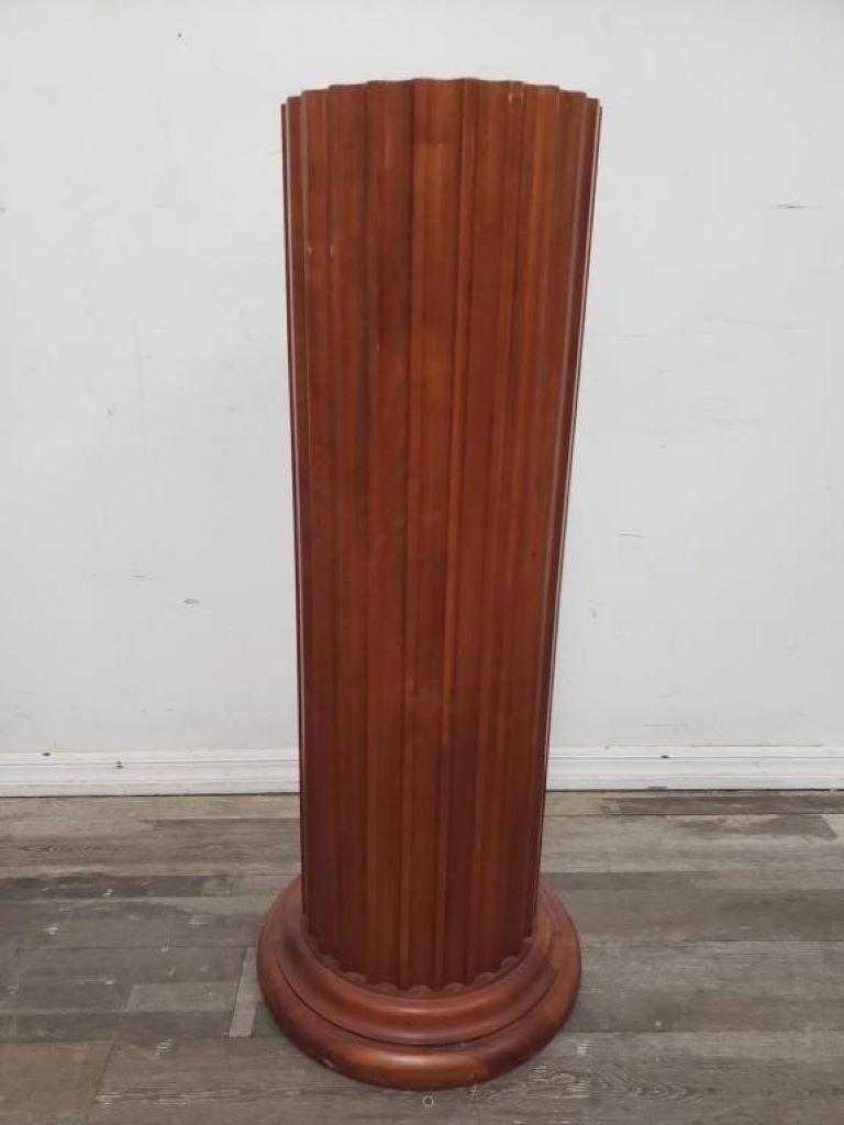 Pair of decorative pedestal columns manufactured by John Widdicomb and Company. Grand Rapids, Michigan. The John Widdicomb Pedestal is a masterpiece of craftsmanship and design, showcasing exquisite detailing and unparalleled elegance. This pedestal